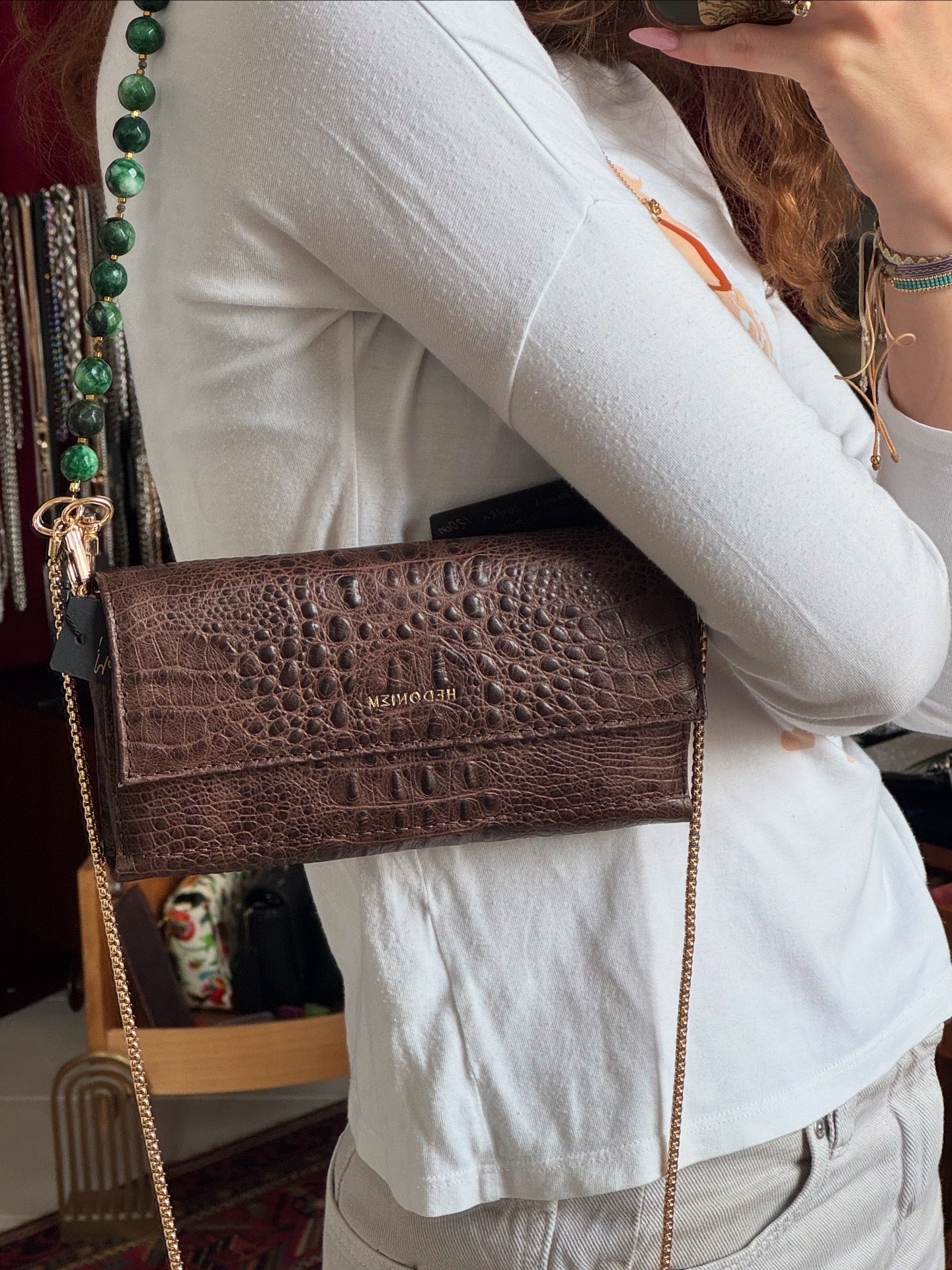 "All in one" 4-in-1 bag, crocodile-embossed leather. Available in several colors.