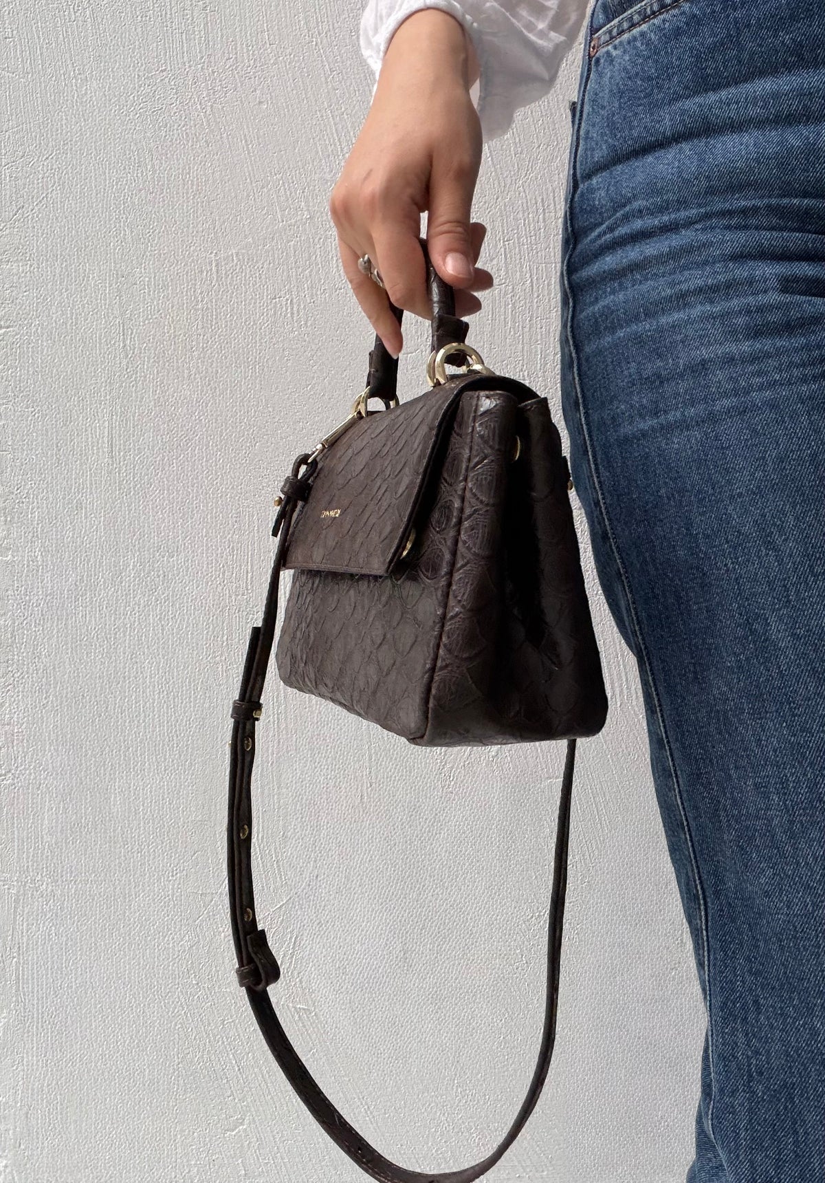 "Audrey" embossed scale-effect leather. Available in two colours