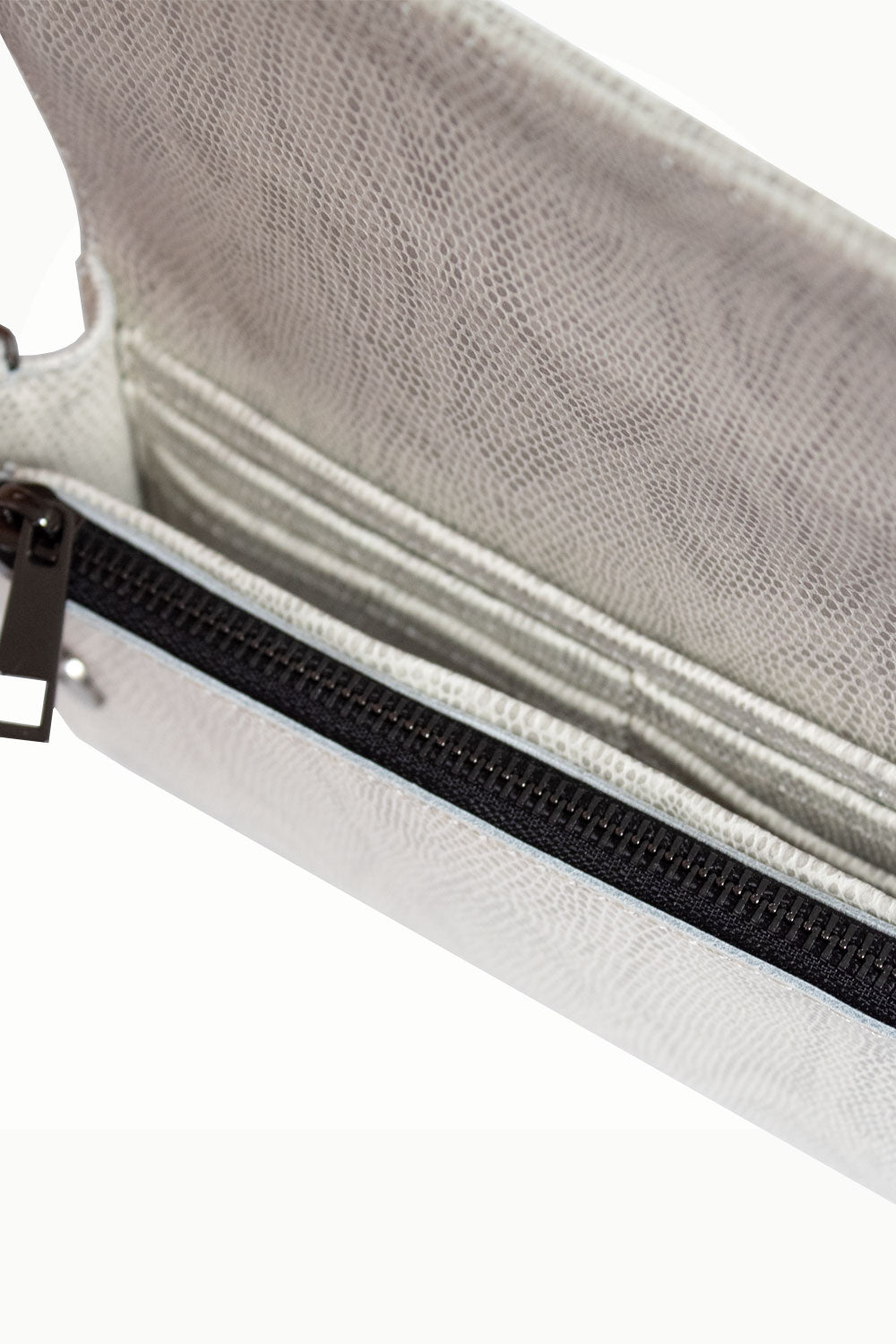 "All in one" 4-in-1 bag, black and white bag embossed with a snake pattern