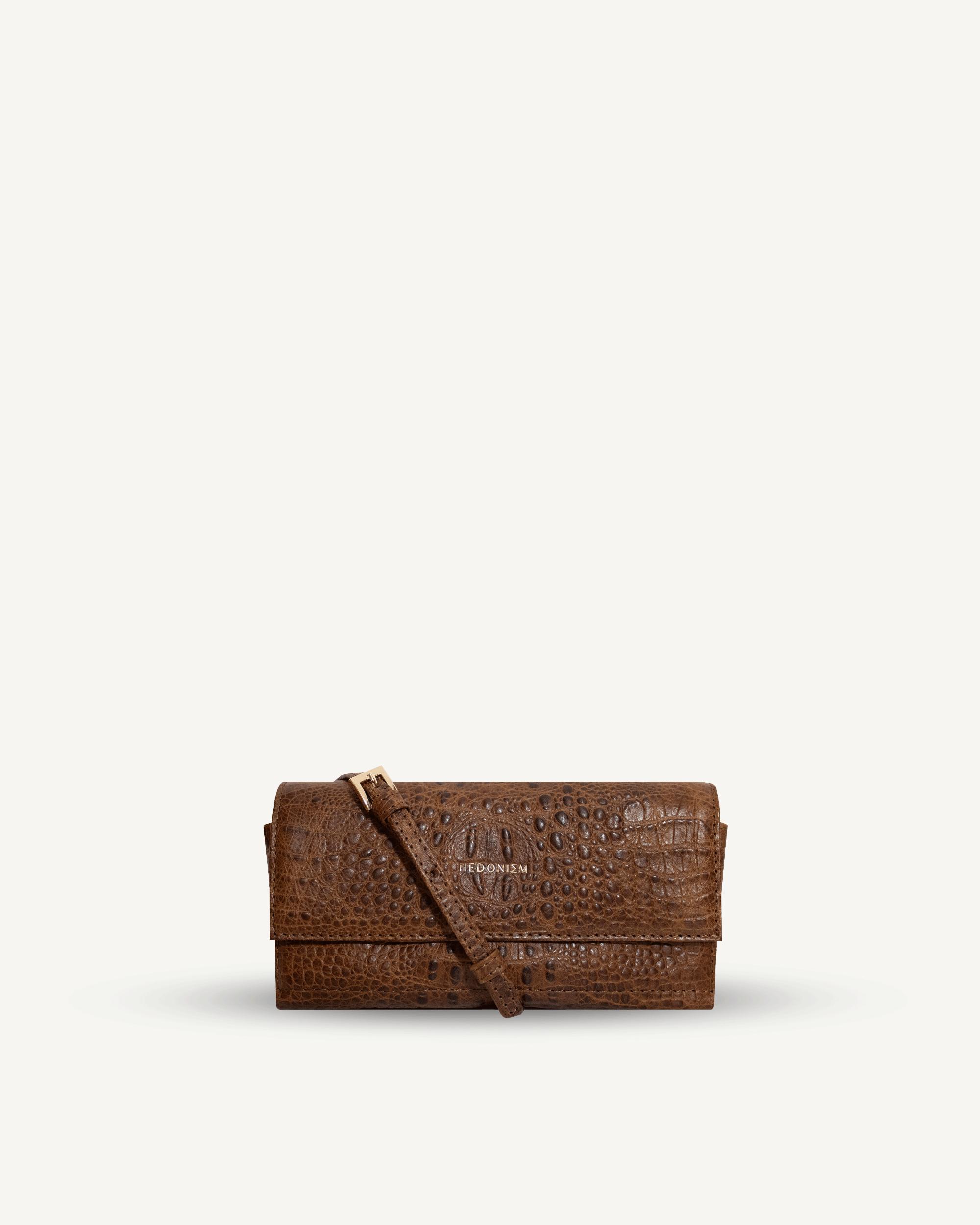 "All in one" 4-in-1 bag, crocodile-embossed leather. Available in several colors.