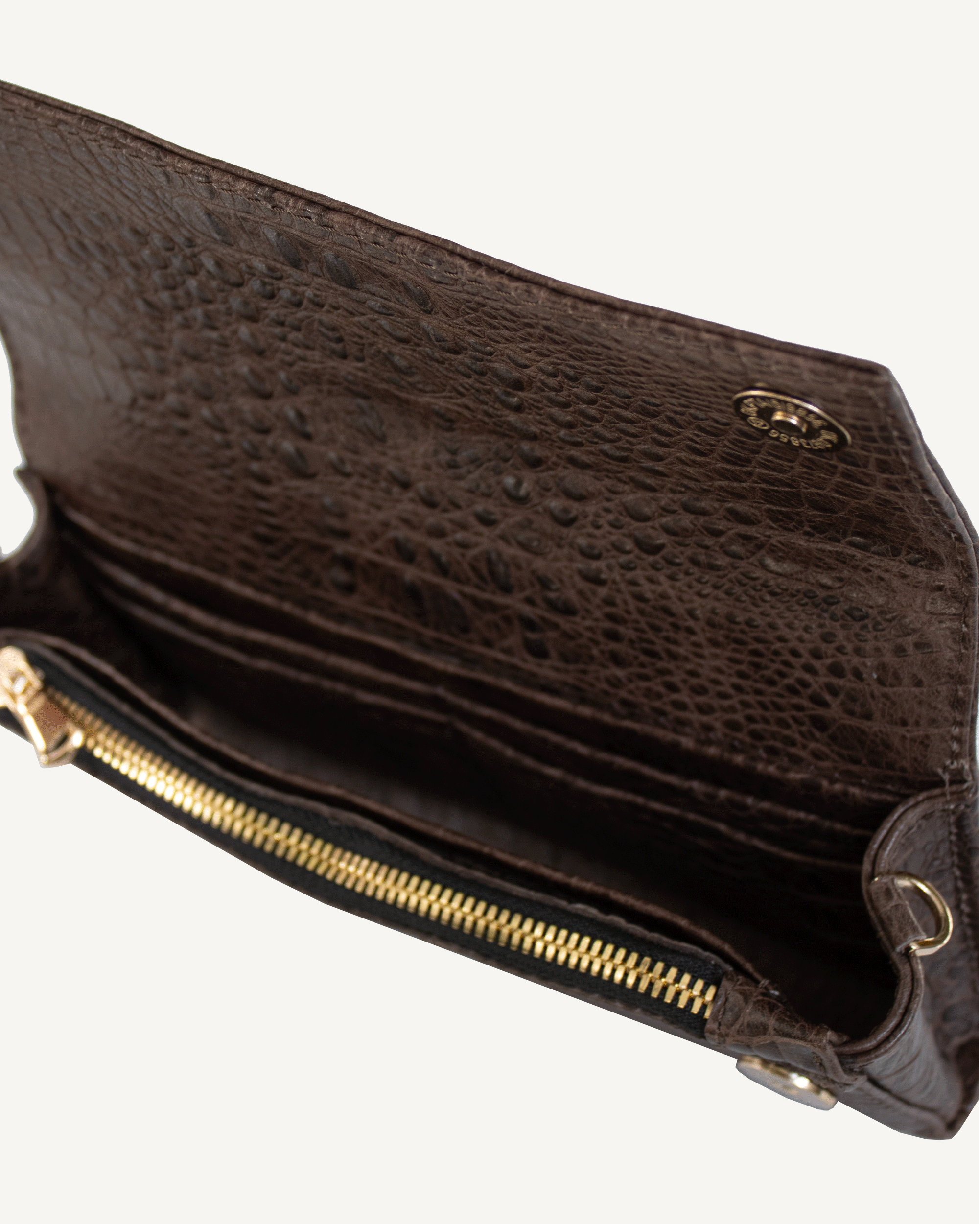 "All in one" 4-in-1 bag, crocodile-embossed leather. Available in several colors.