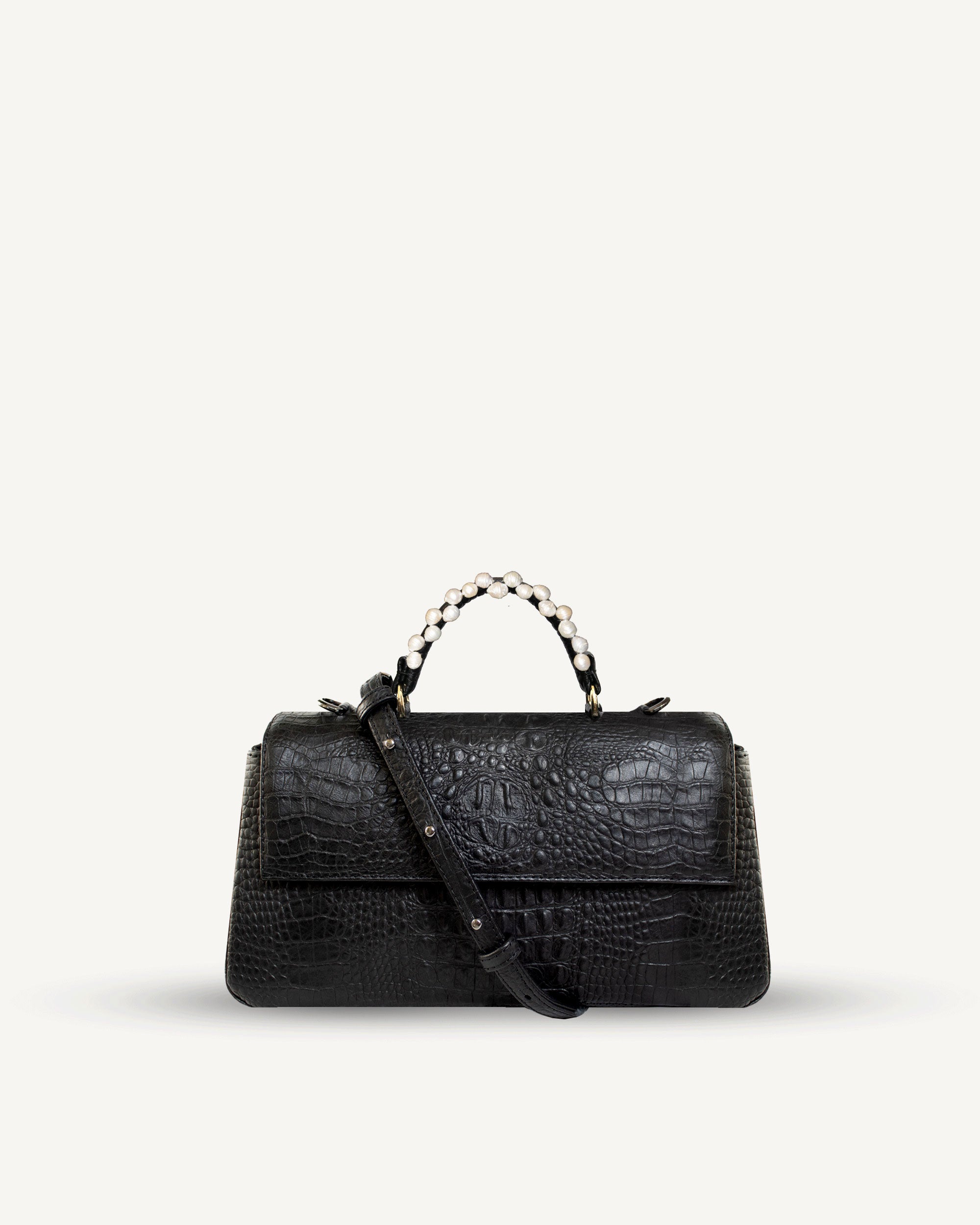 "Audrey" crocodile-embossed leather with freshwater pearls. Available in several colors.