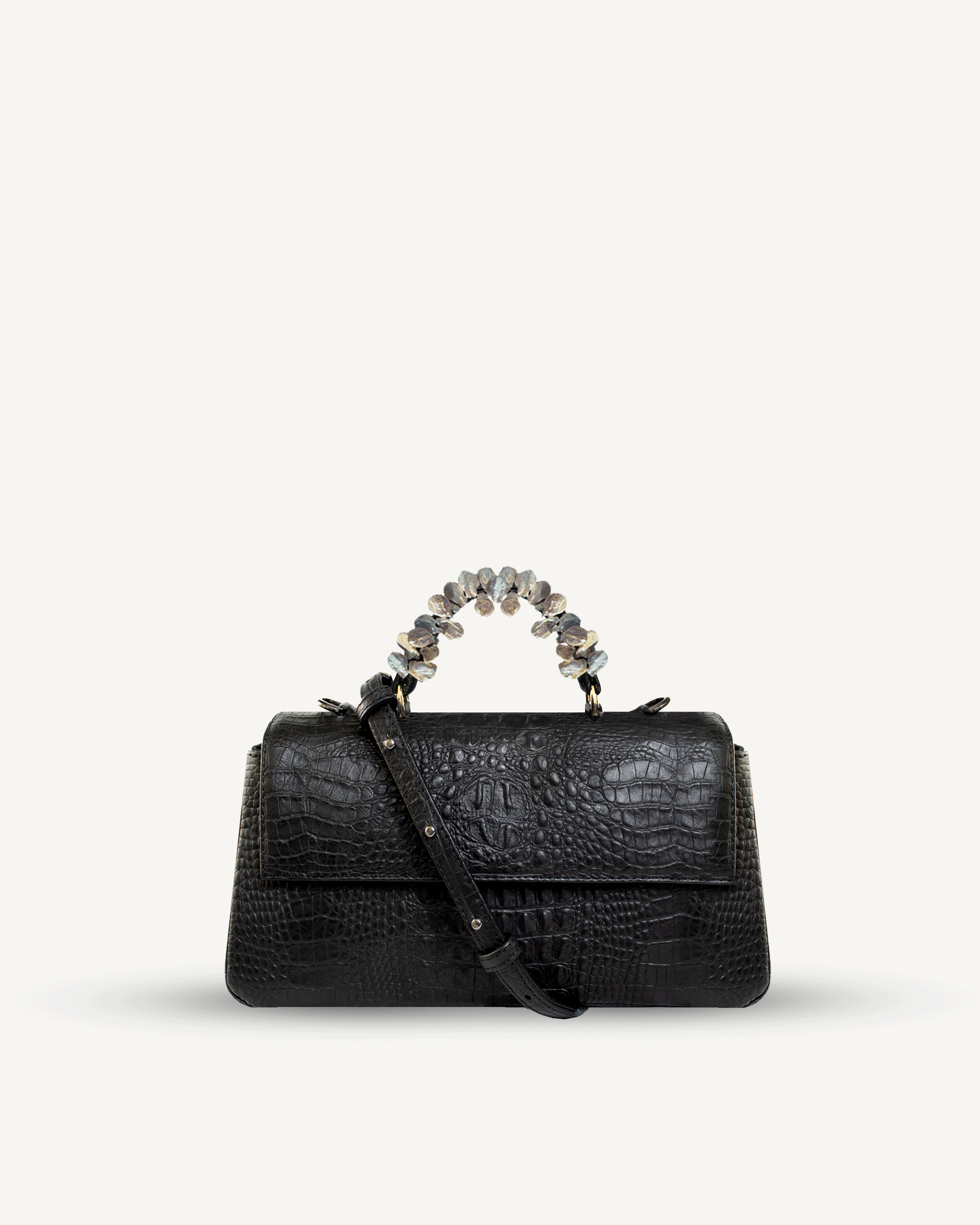 "Audrey" crocodile-embossed leather with freshwater pearls. Available in several colors.