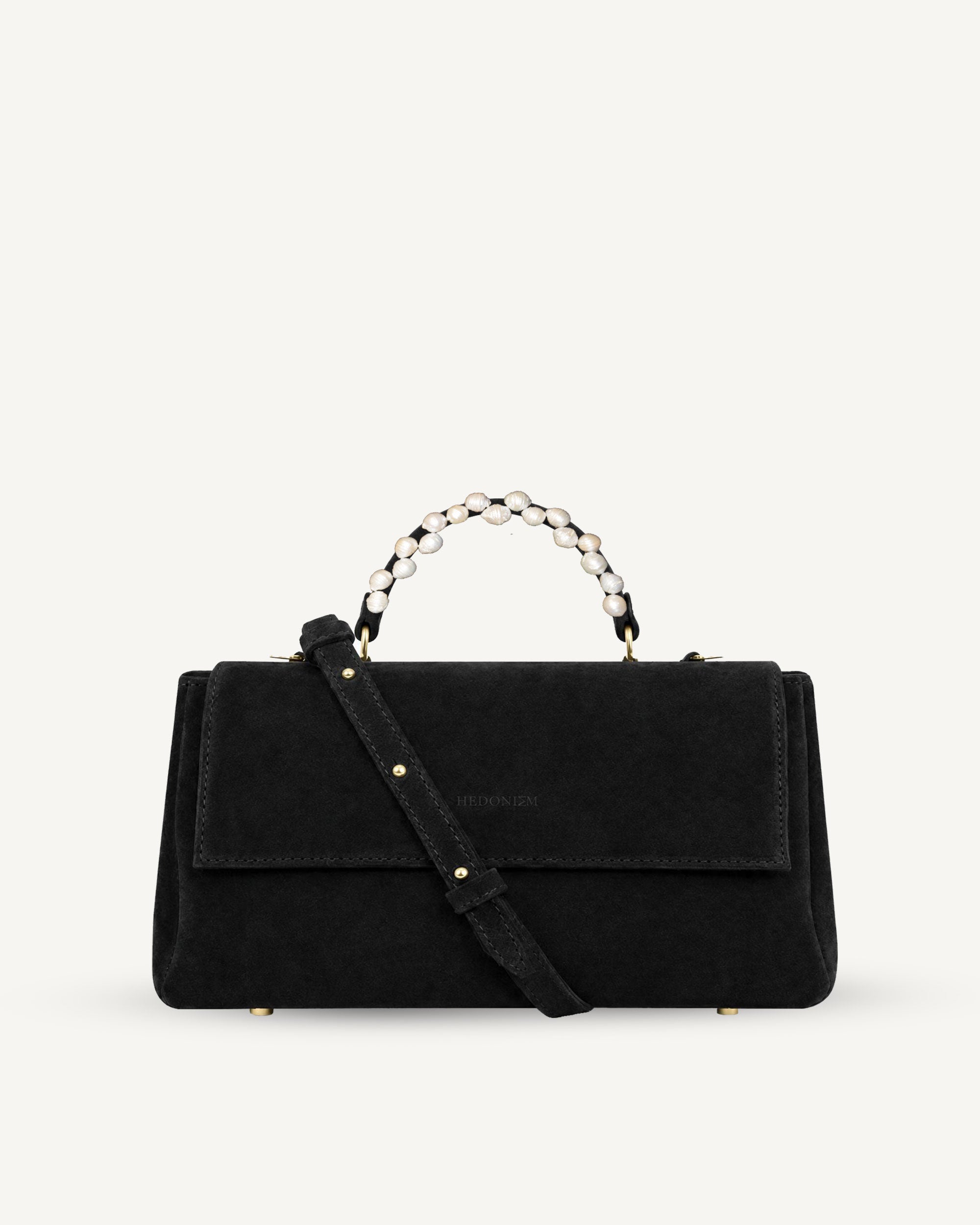 "Audrey Baguette" snake-embossed leather. Available in two colors.