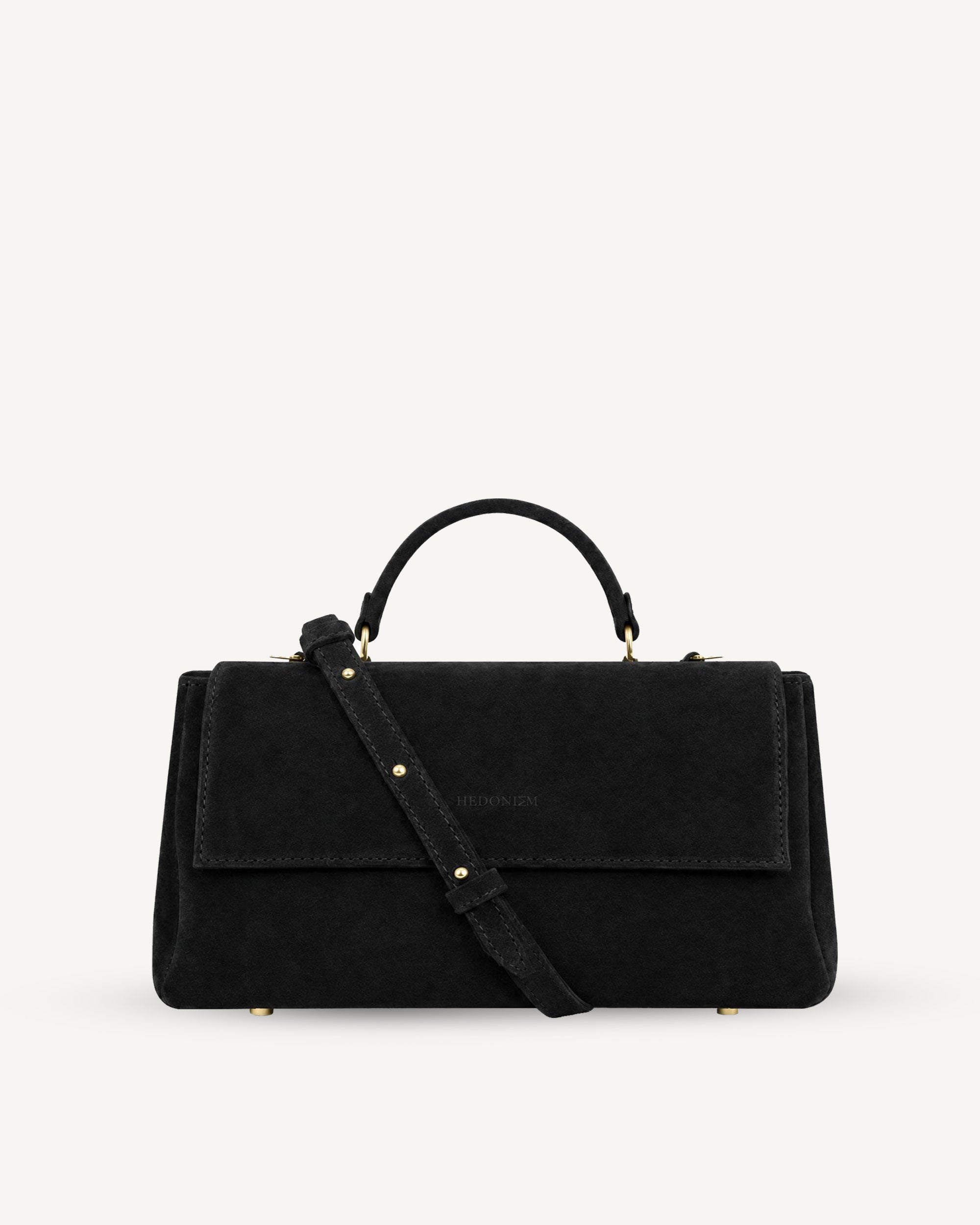 "Audrey Baguette" snake-embossed leather. Available in two colors.