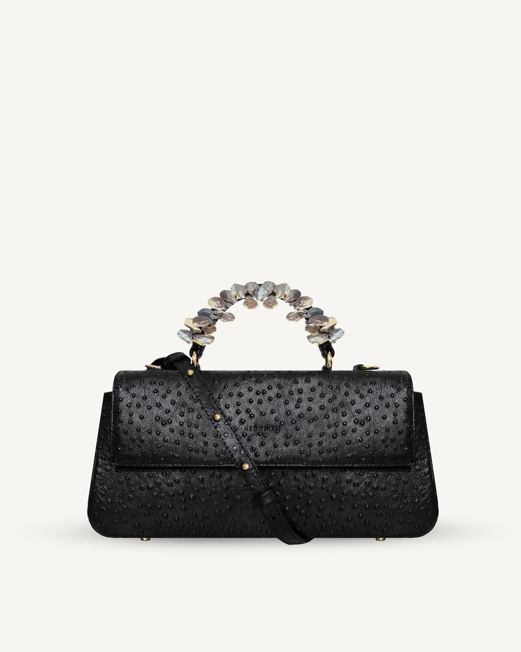 "Audrey Baguette" with freshwater pearls and ostrich-effect leather. Two colors