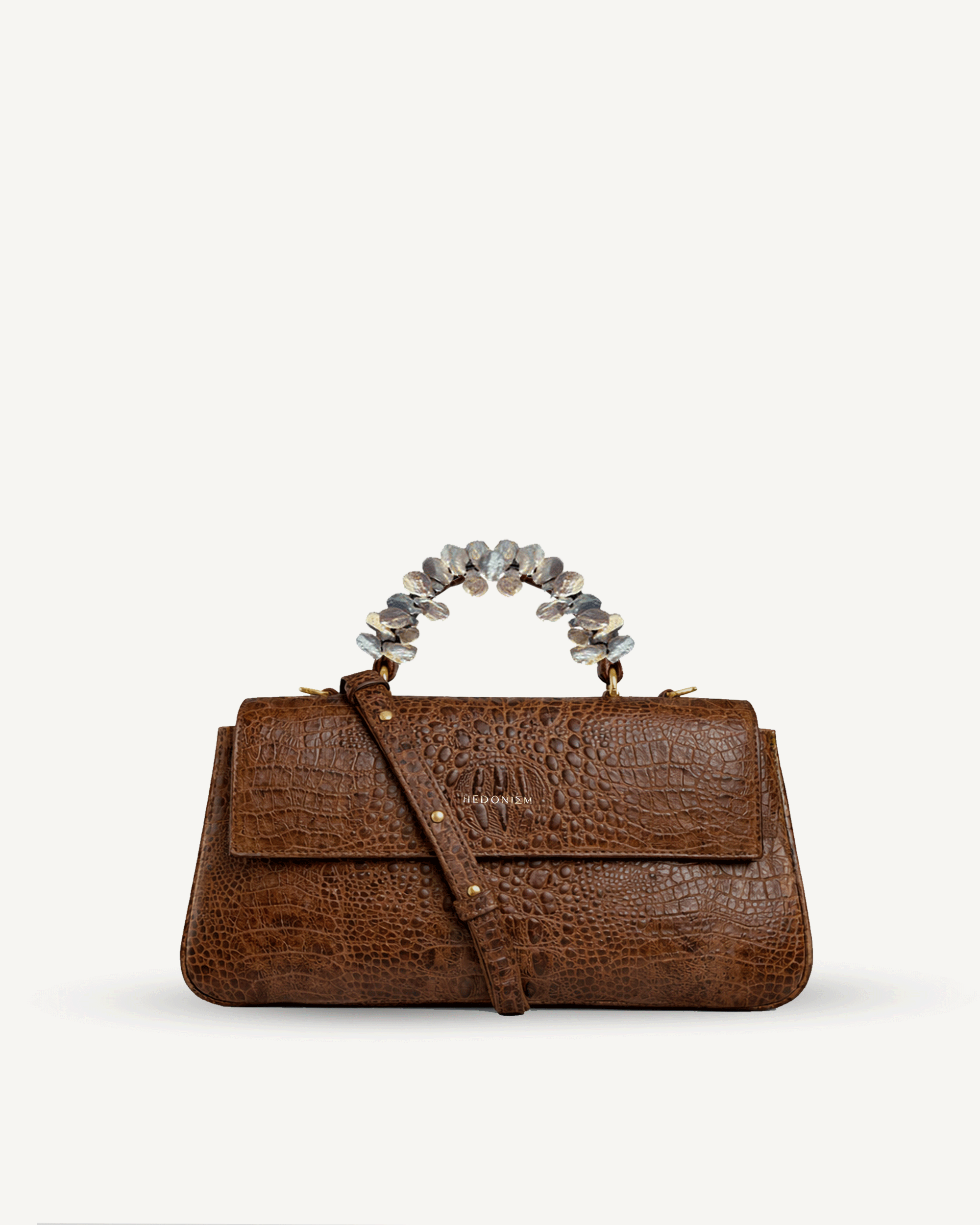 "Audrey Baguette" crocodile-embossed leather with freshwater pearls. Available in several leather colors.