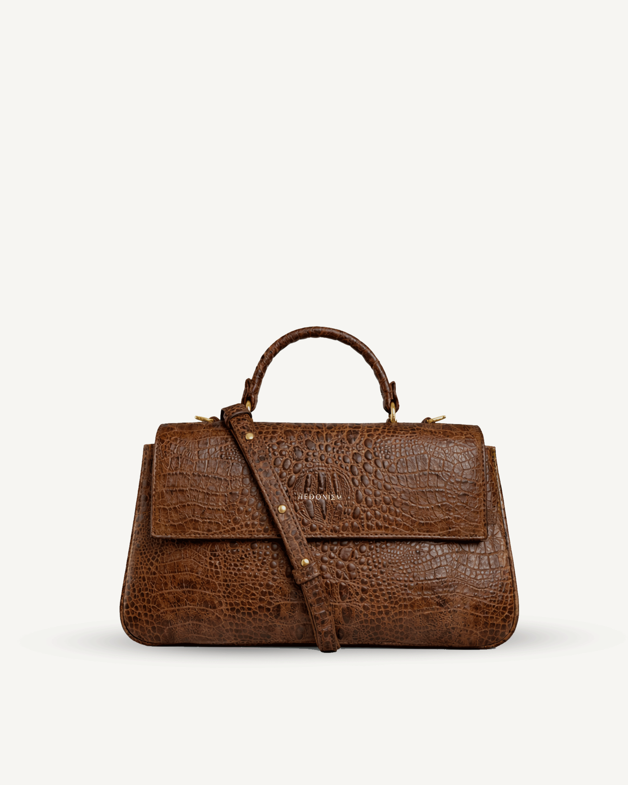 "Audrey M+" crocodile-embossed leather. Several leather colors.