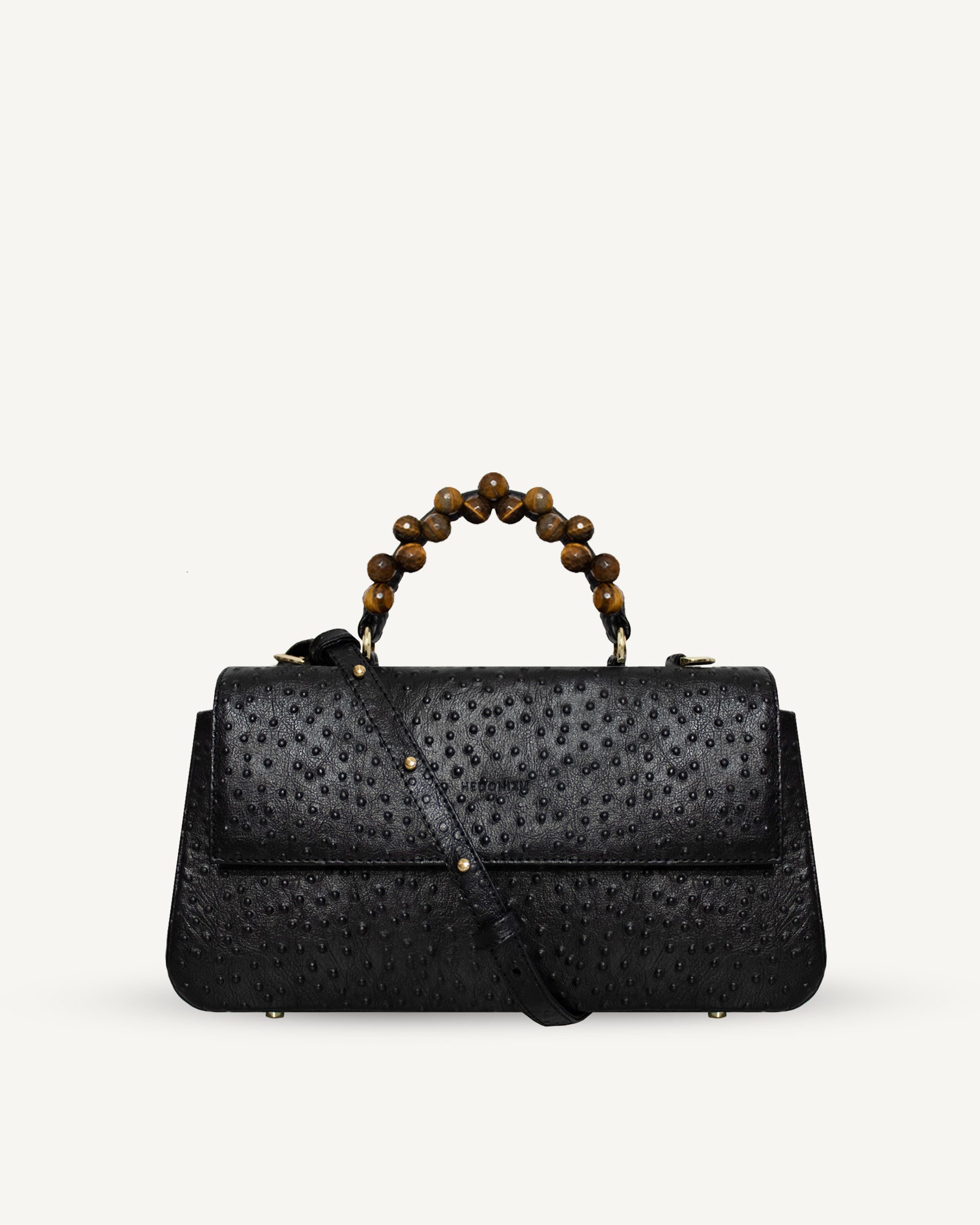 "Audrey M+" with tiger's eye, ostrich-embossed leather. Available in two colors