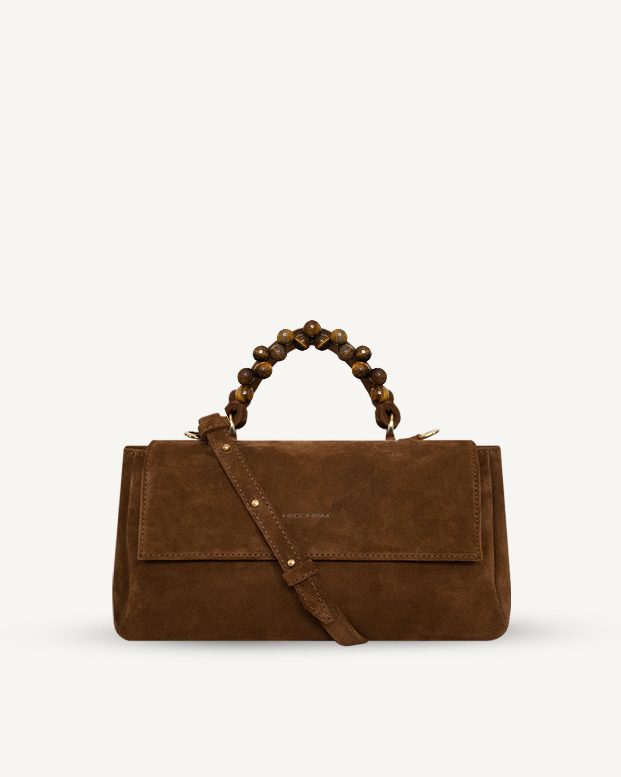 "Audrey" handbag with handle embossed on ostrich leather. Two colors