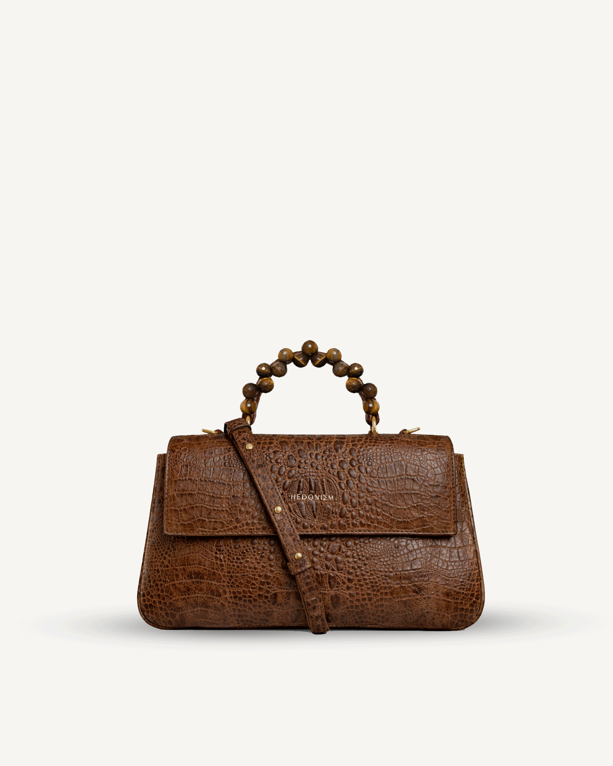 "Audrey" tiger's eye bag, crocodile-embossed leather. Several leather colors.