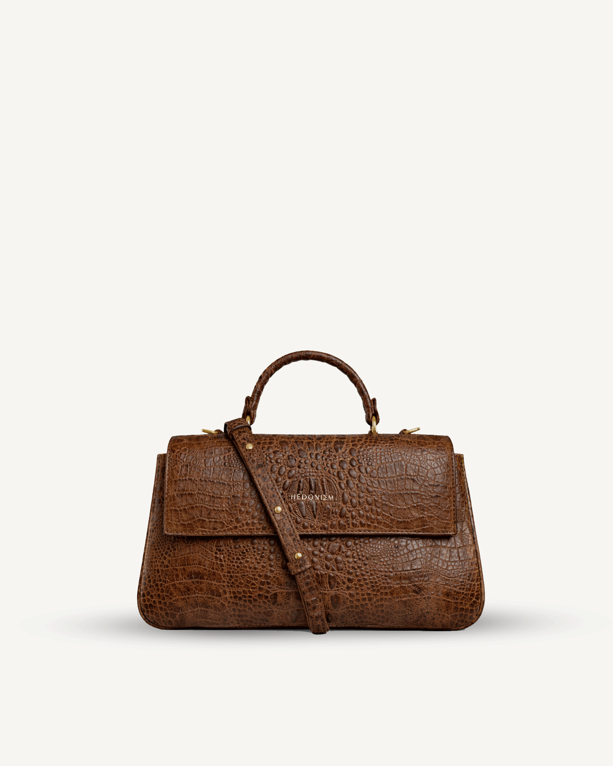 "Audrey" crocodile-embossed leather. Available in several colors.