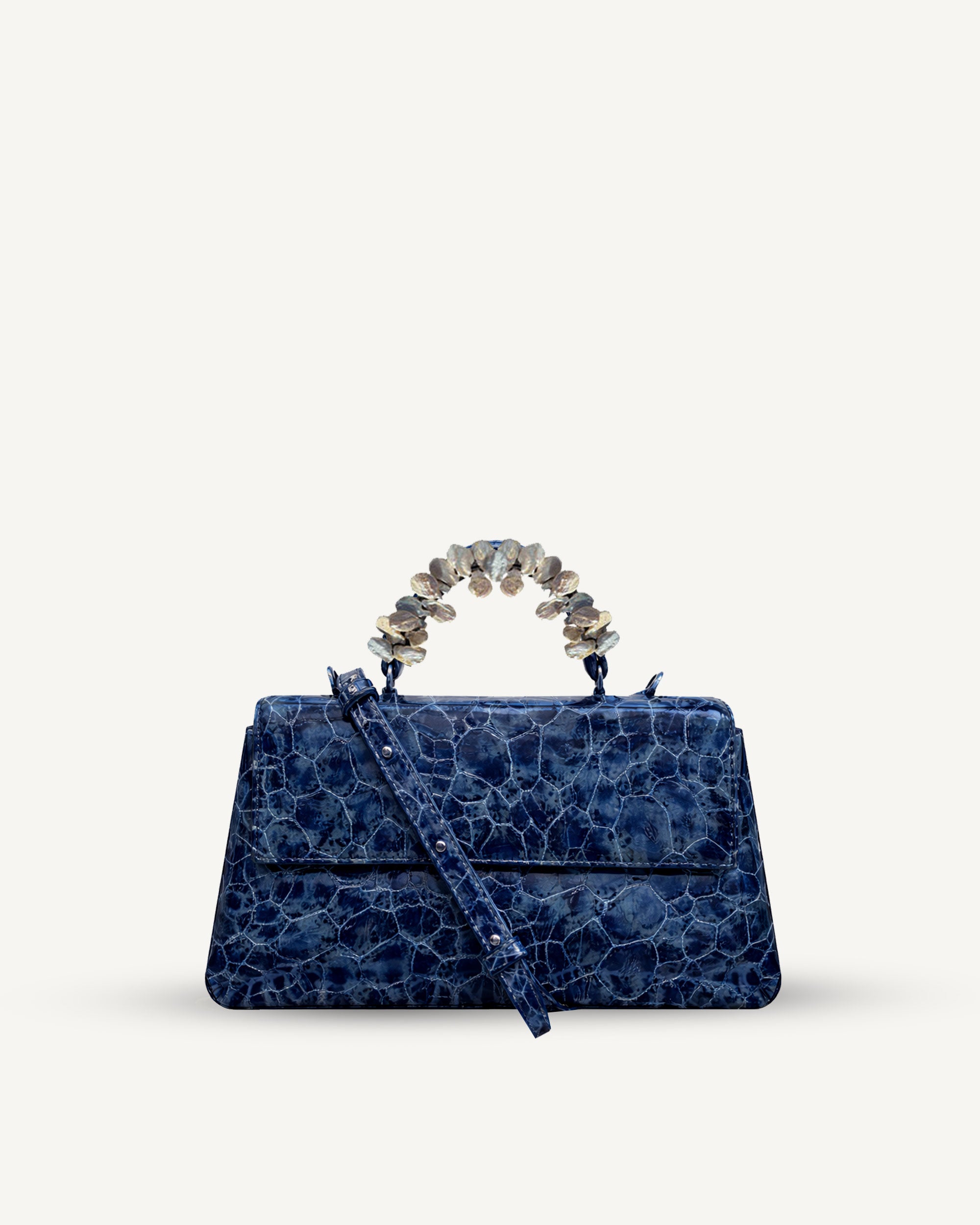 "Audrey" patent leather embossed with freshwater pearls. Available in three colors.