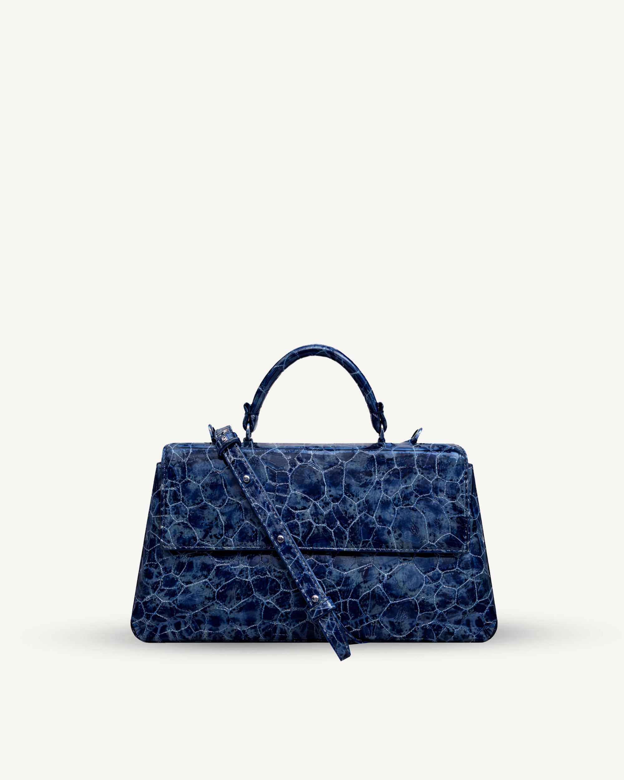 "Audrey" embossed patent leather. Available in three colors.