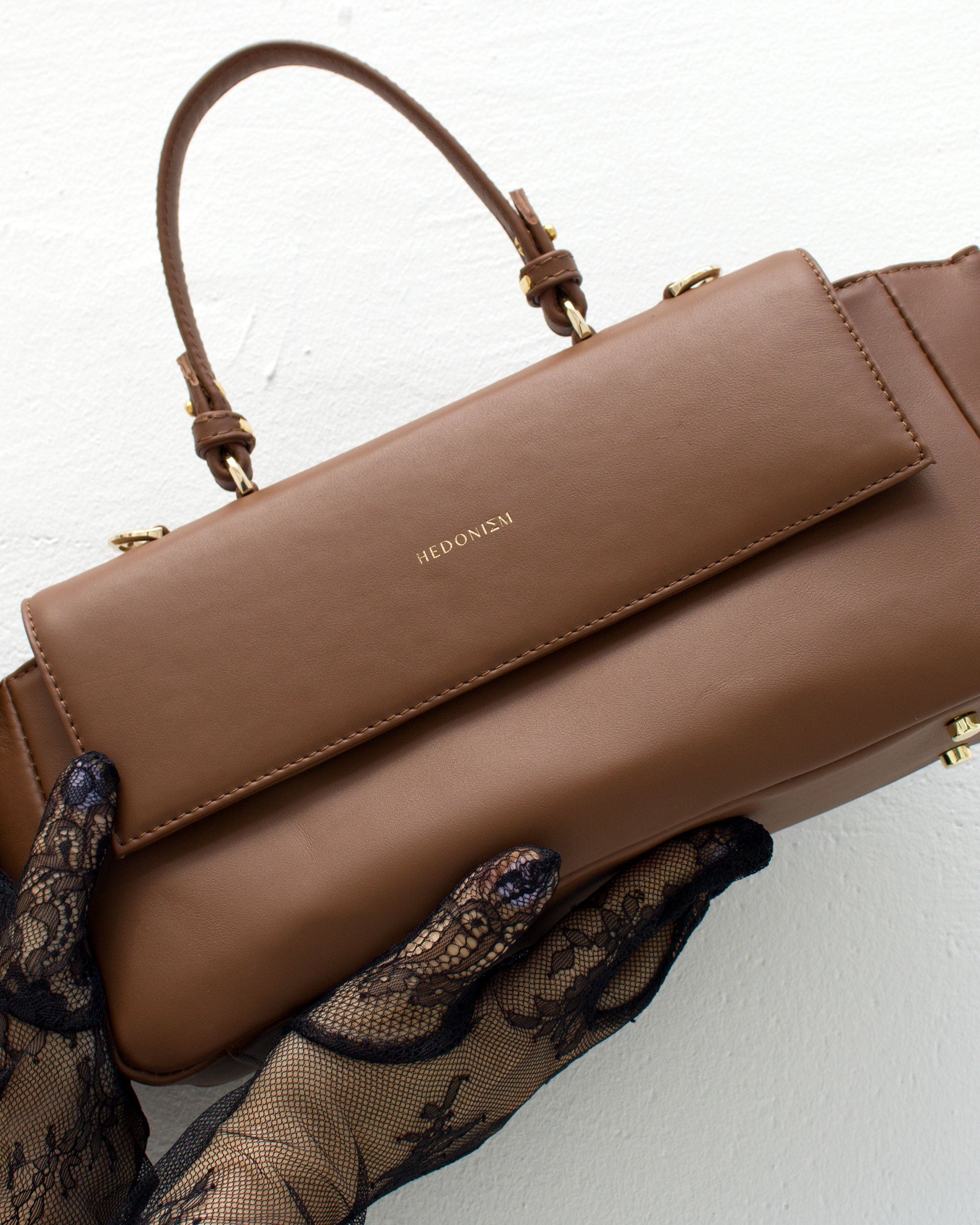 "Ophelia" crocodile-embossed leather. Available in several colors.