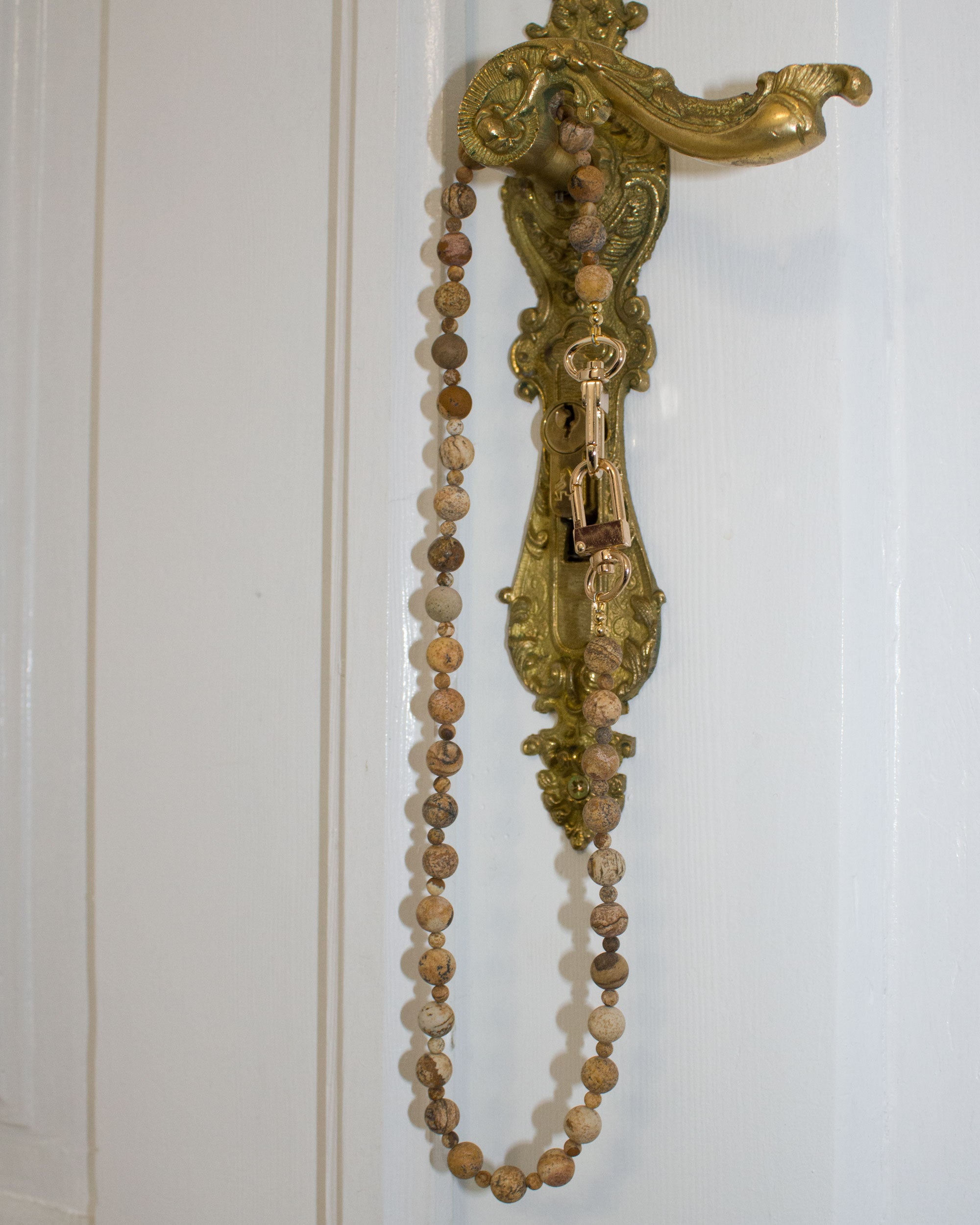 Faceted purple agates and gold-colored hematite