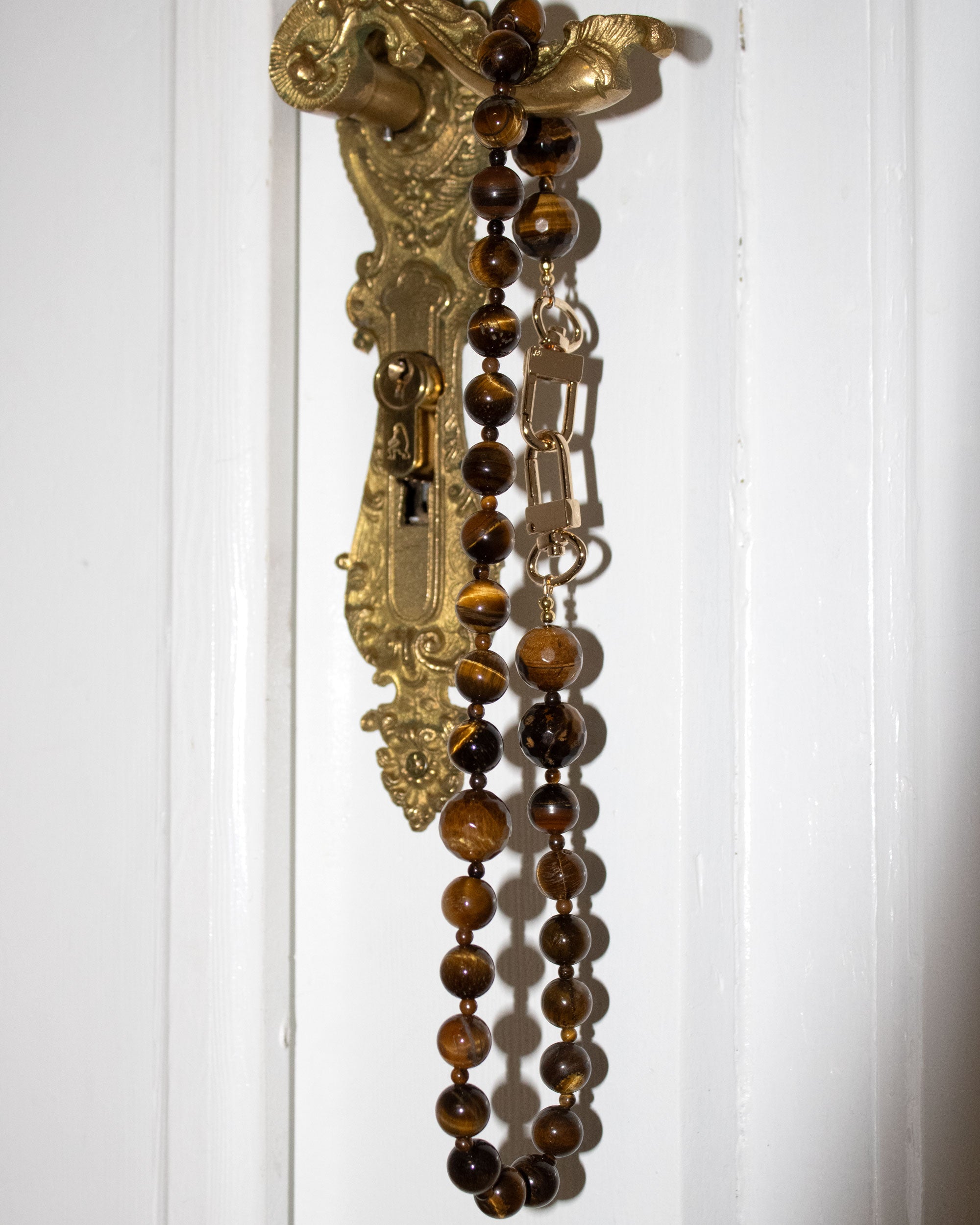 Faceted tiger's eye in three sizes