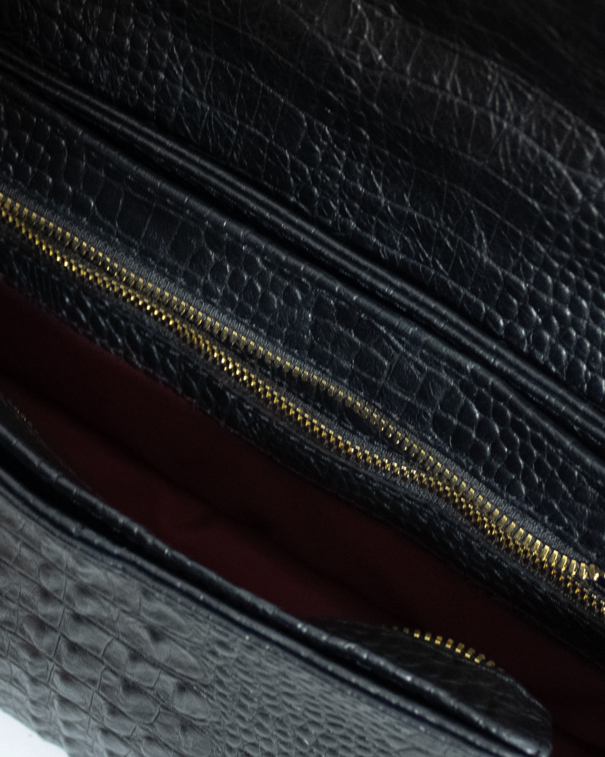 "Ophelia" crocodile-embossed leather. Available in several colors.