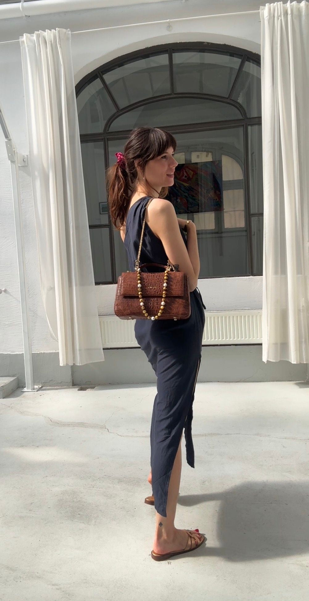 "Audrey M+" crocodile-embossed leather. Several leather colors.