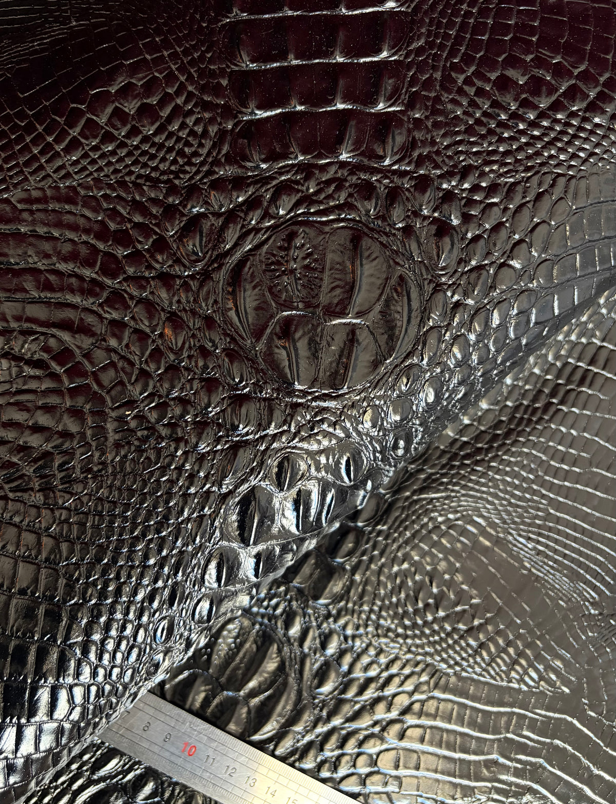 "Audrey" crocodile embossed leather. Available in several colors
