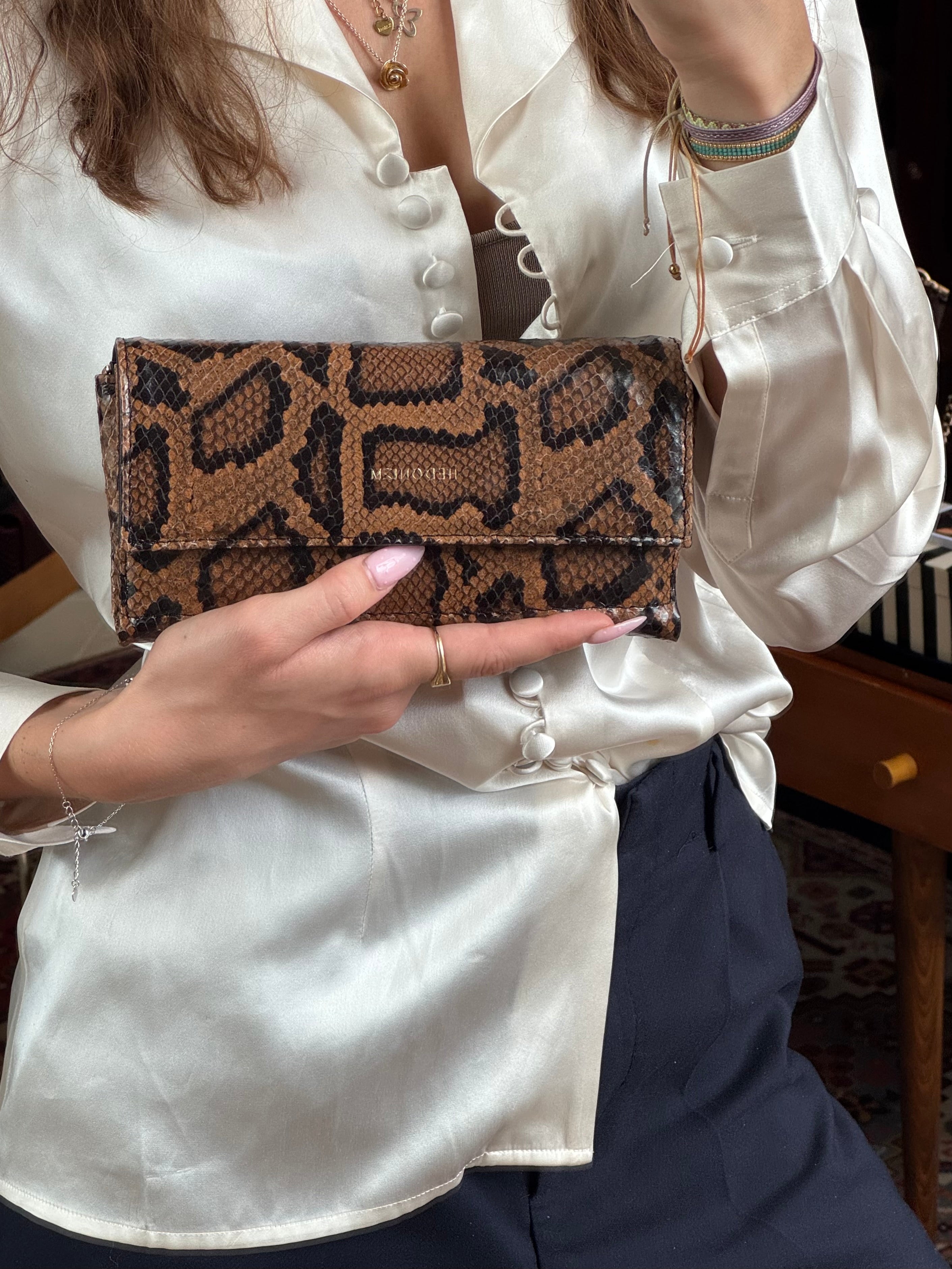 "All in one" 4-in-1 bag, brown and black snake-embossed leather. Last piece.