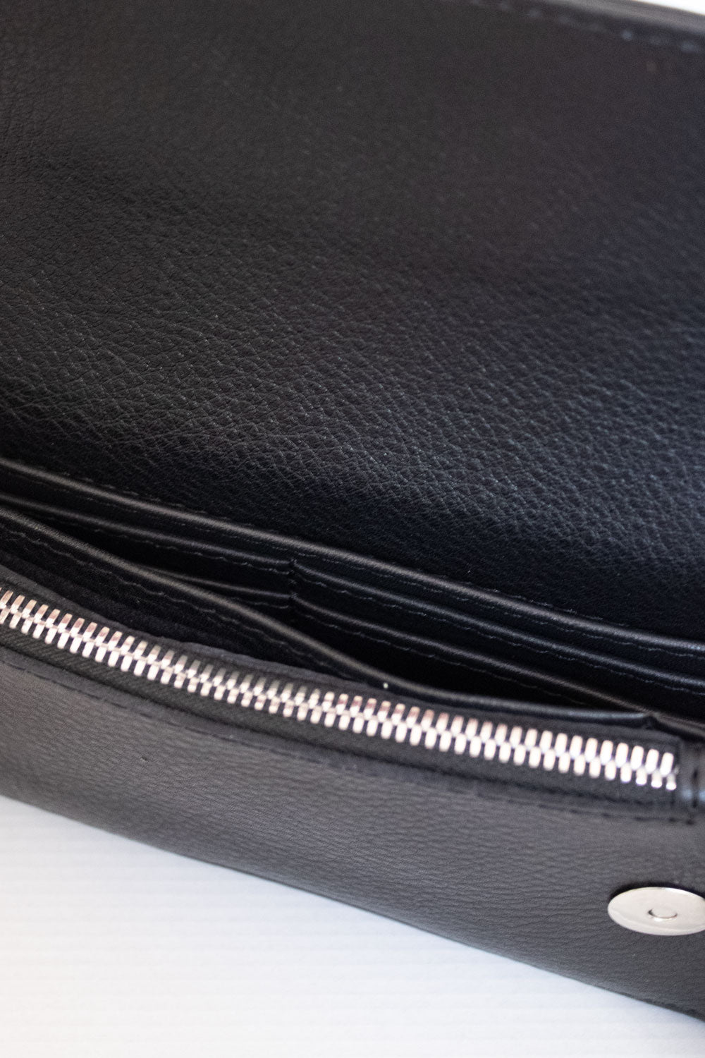 "All in one" 4-in-1 bag, black soft pea leather