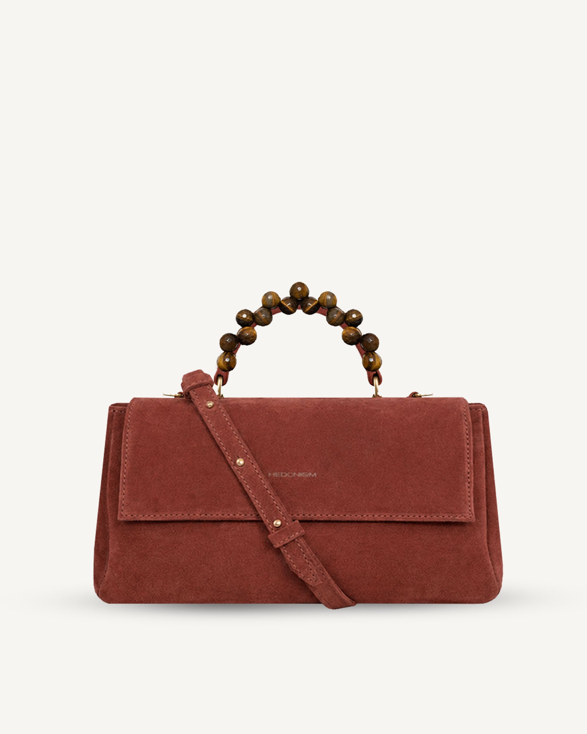 "Audrey" handbag with handle embossed on ostrich leather. Two colors