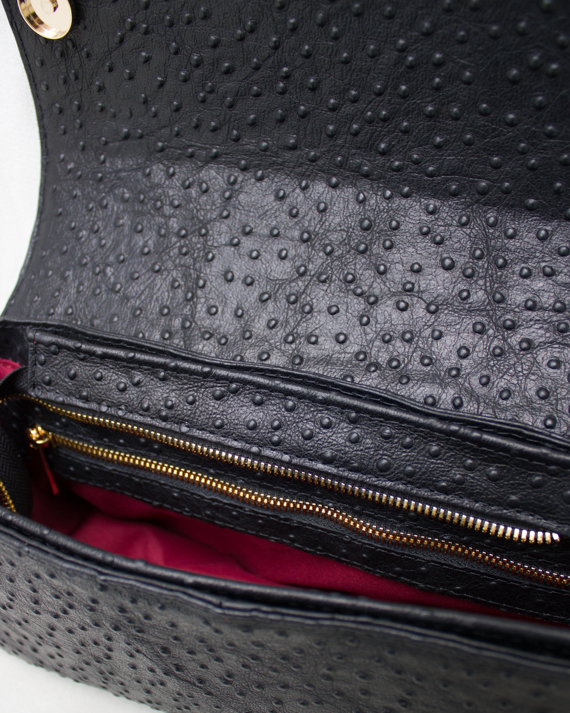 "Audrey Baguette" with tiger's eye, ostrich-embossed leather. Available in two colors