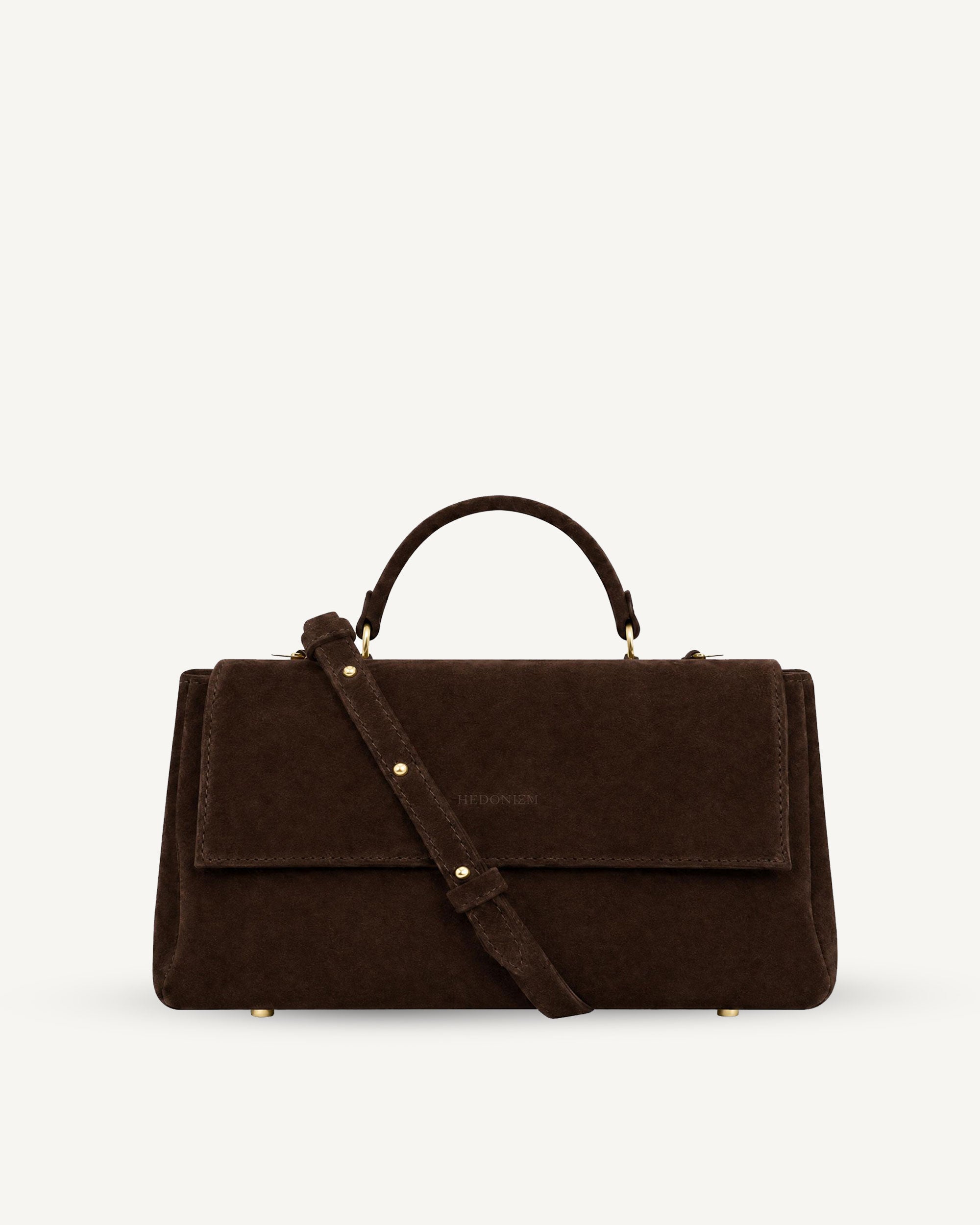 "Audrey Baguette" snake-embossed leather. Available in two colors.
