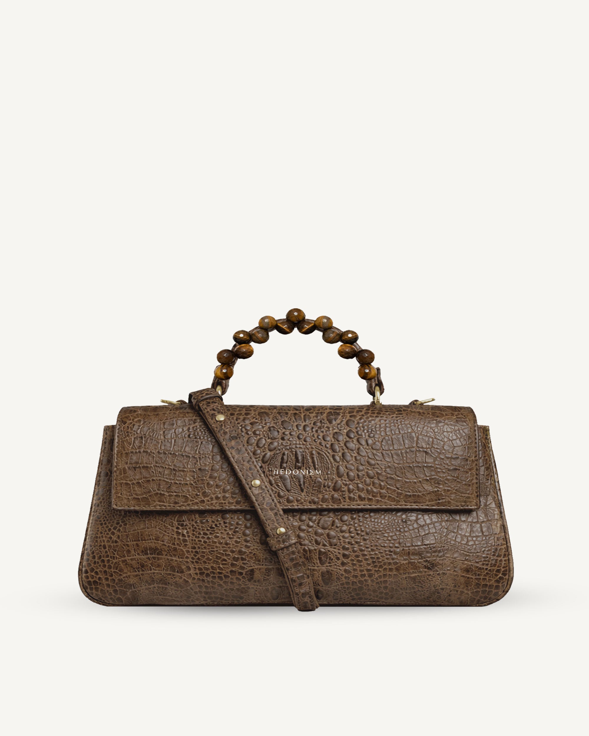 "Audrey Baguette" crocodile-embossed leather with faceted tiger's eye. Available in several leather colors.