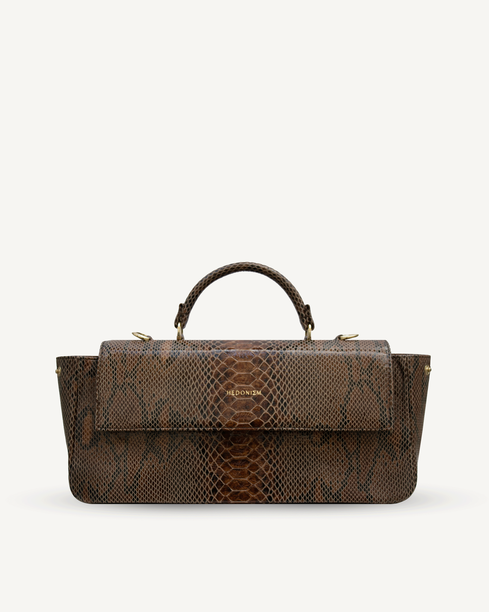 "Audrey Baguette" snake-embossed leather. Available in two colors.