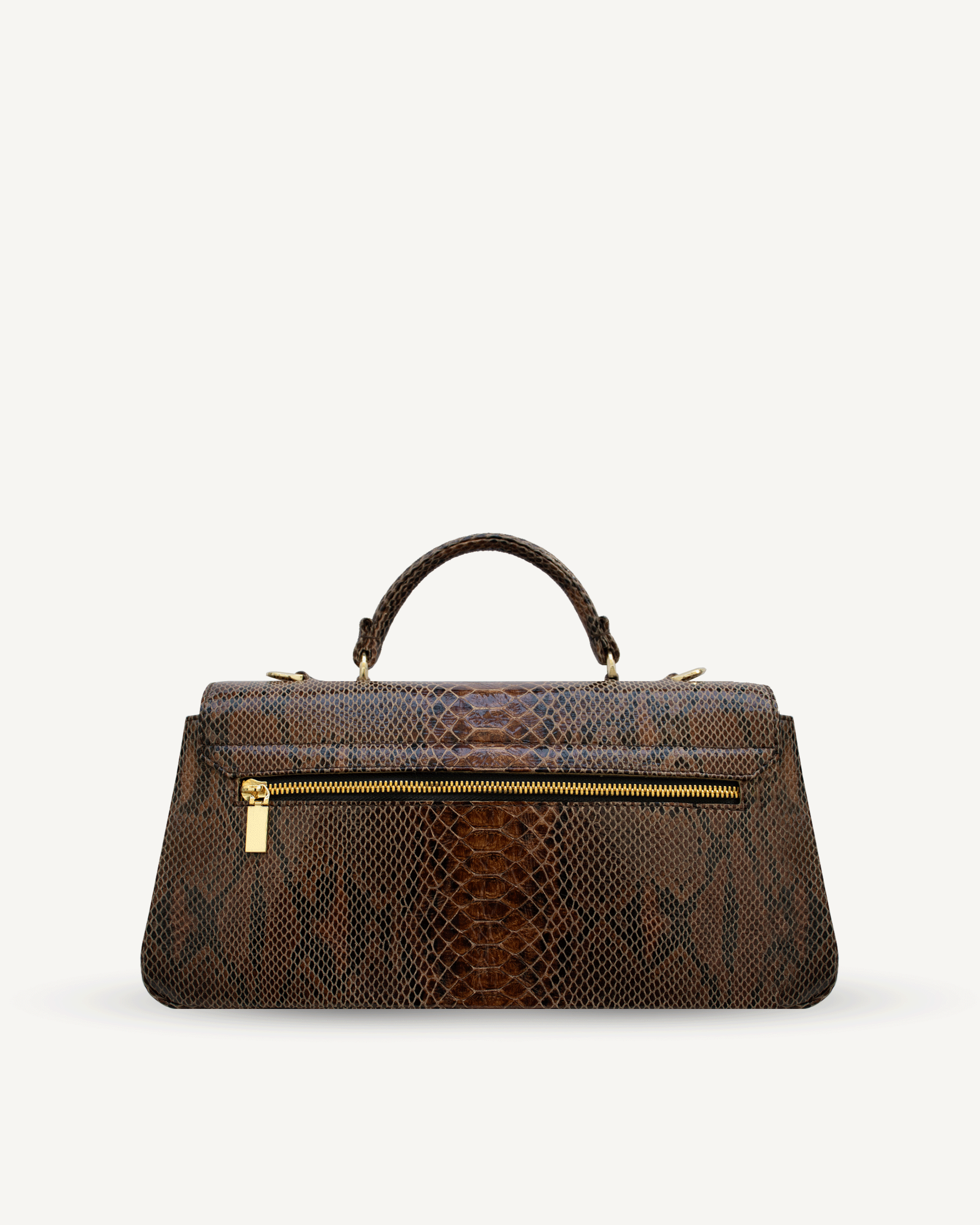 "Audrey Baguette" snake-embossed leather. Available in two colors.