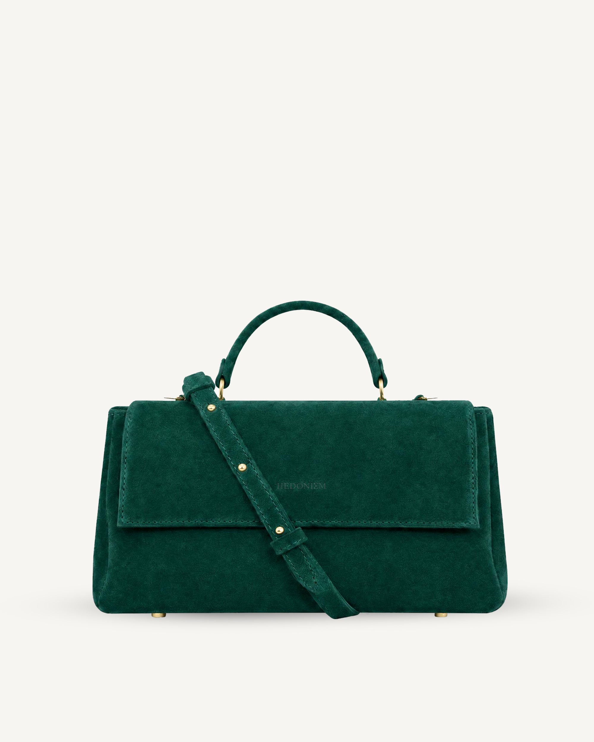 "Audrey Baguette" snake-embossed leather. Available in two colors.
