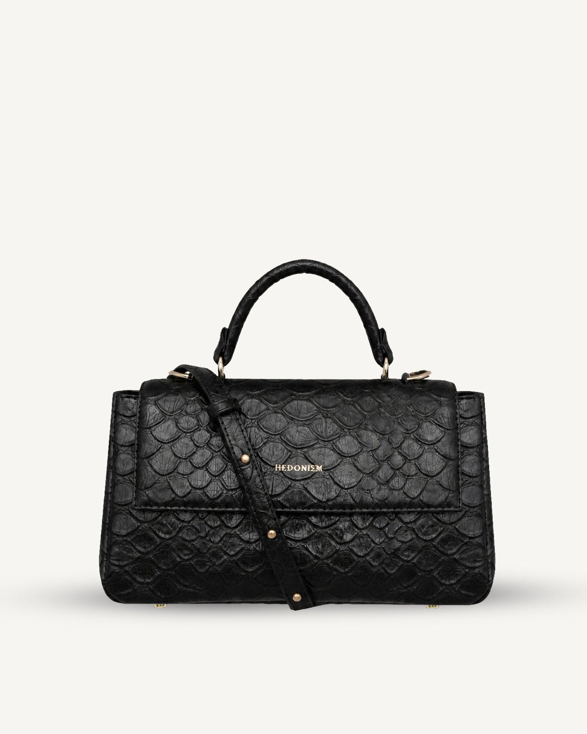 "Audrey M+" embossed scale-pattern leather. Available in two colours