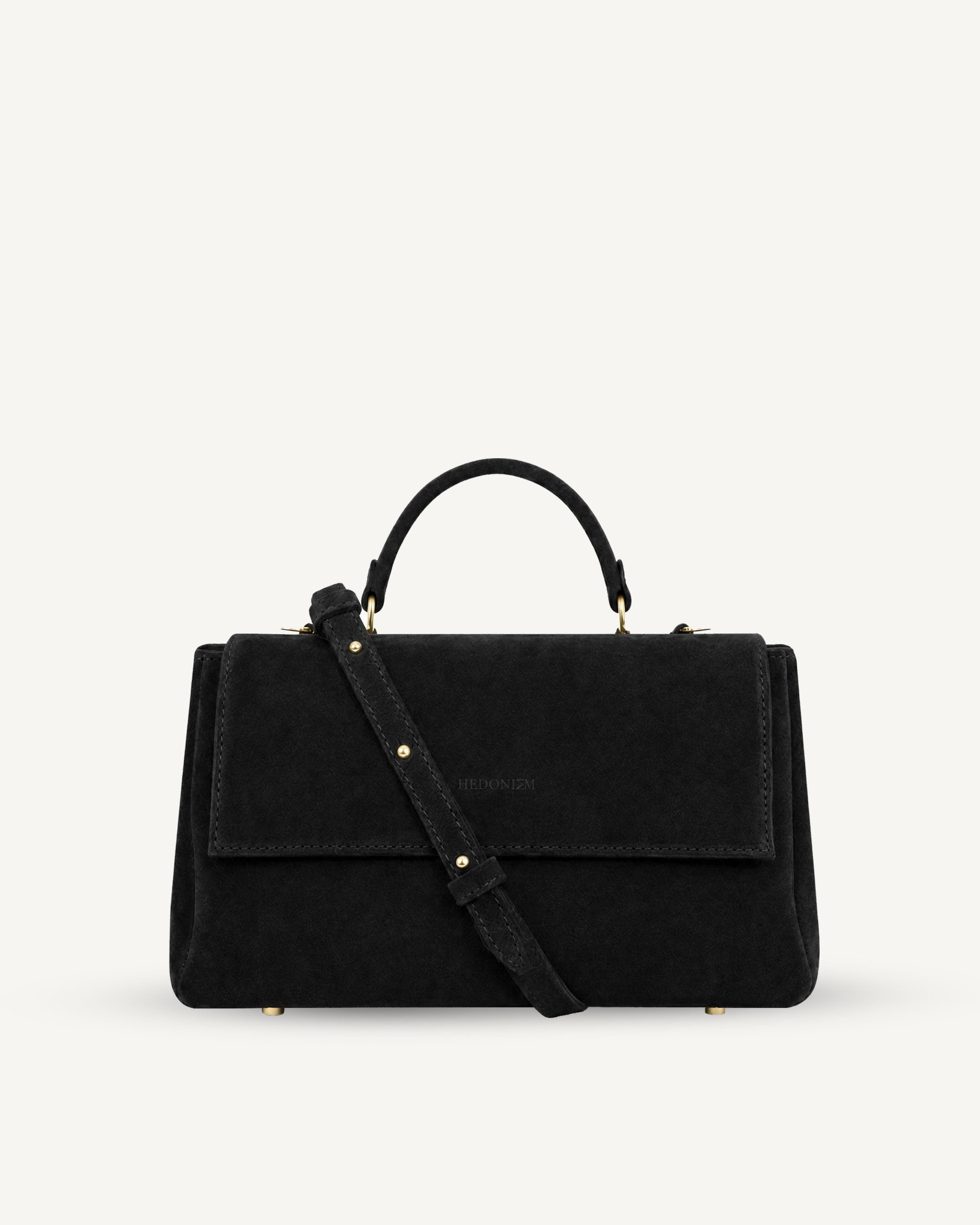 "Audrey M+" snake-embossed leather. Available in two colors.