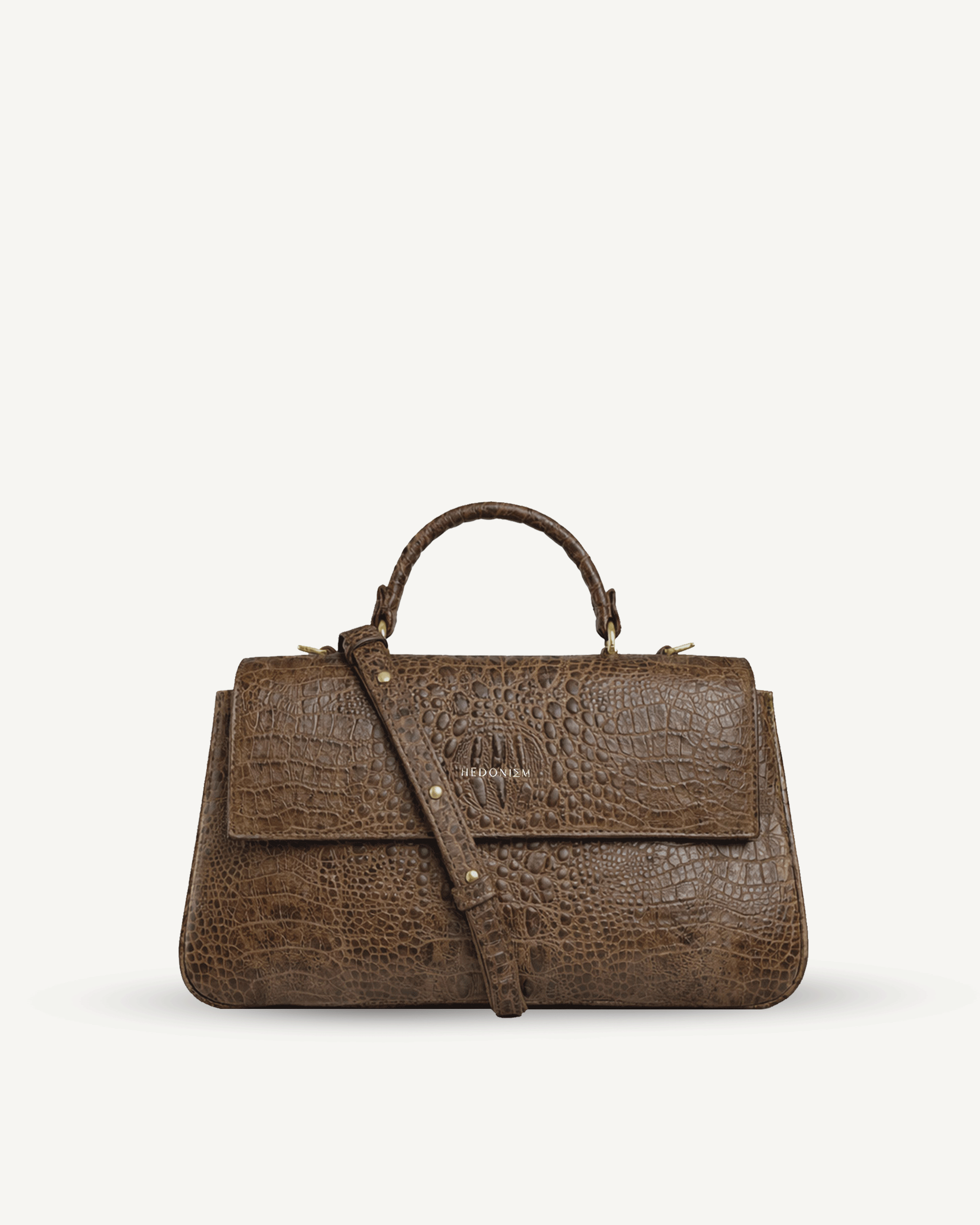 "Audrey M+" crocodile-embossed leather. Several leather colors.