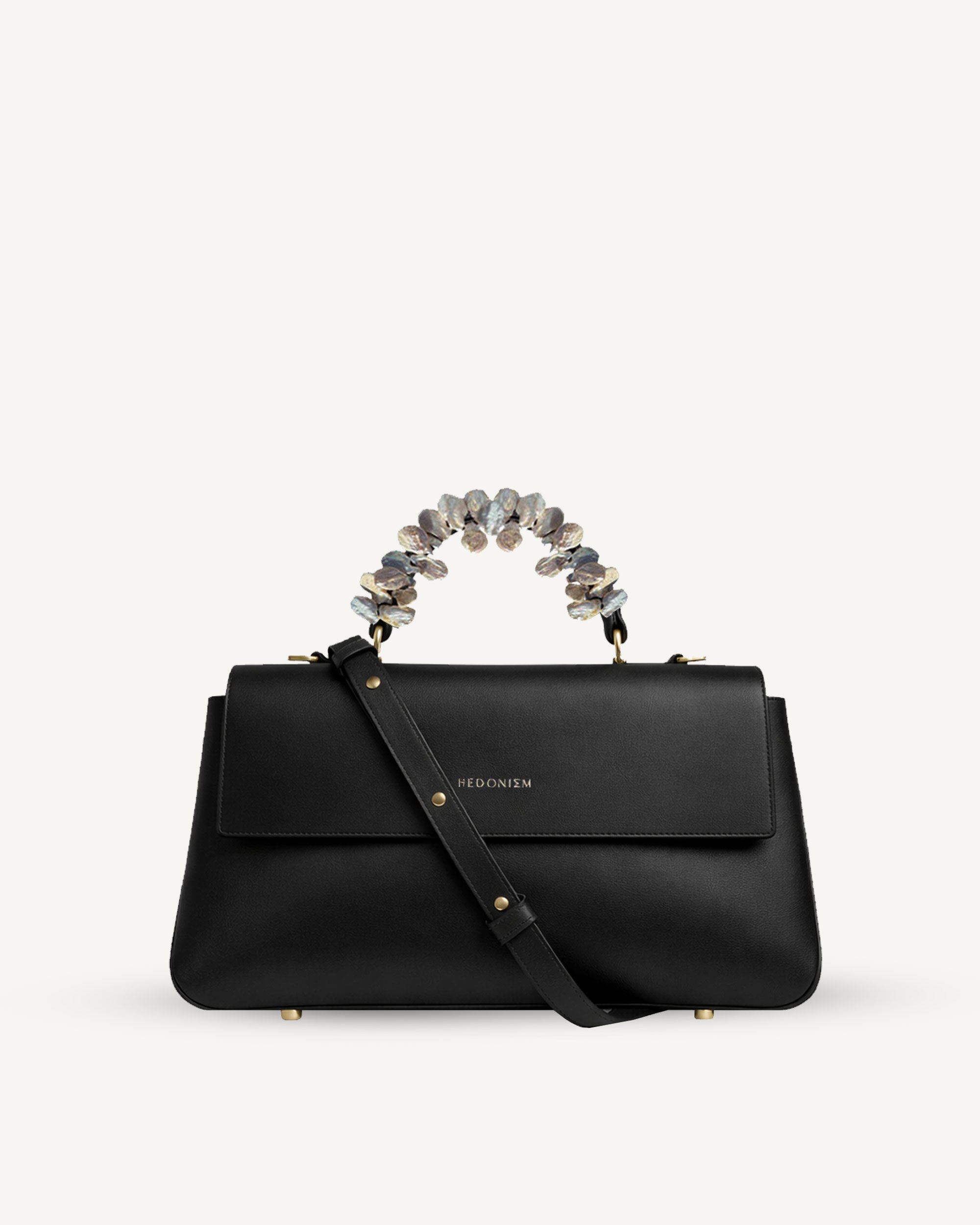 "Audrey M+" patent leather embossed with freshwater pearls. Available in three colors.