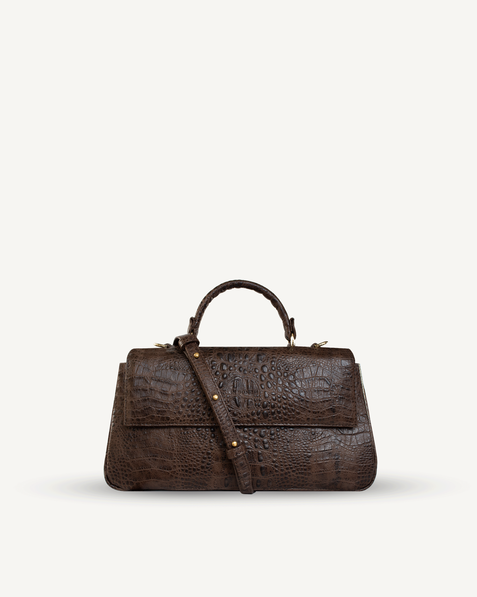 "Audrey" crocodile-embossed leather. Available in several colors.