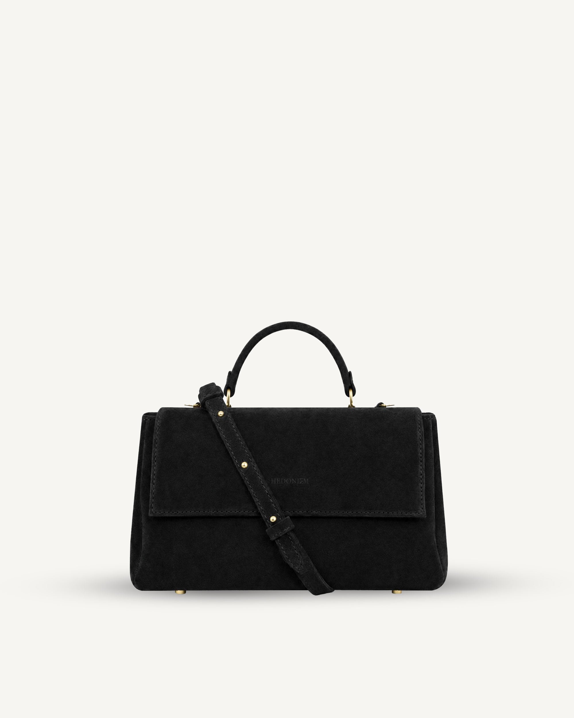 "Audrey" handbag with handle embossed on ostrich leather. Two colors
