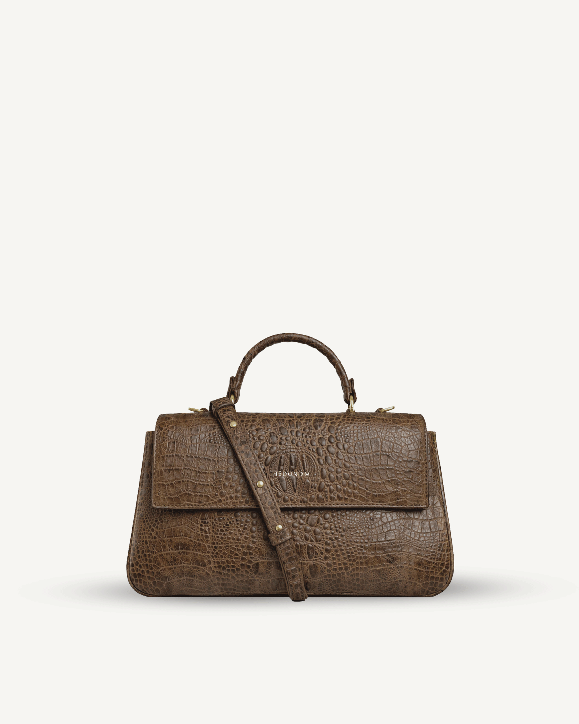 "Audrey" crocodile-embossed leather. Available in several colors.