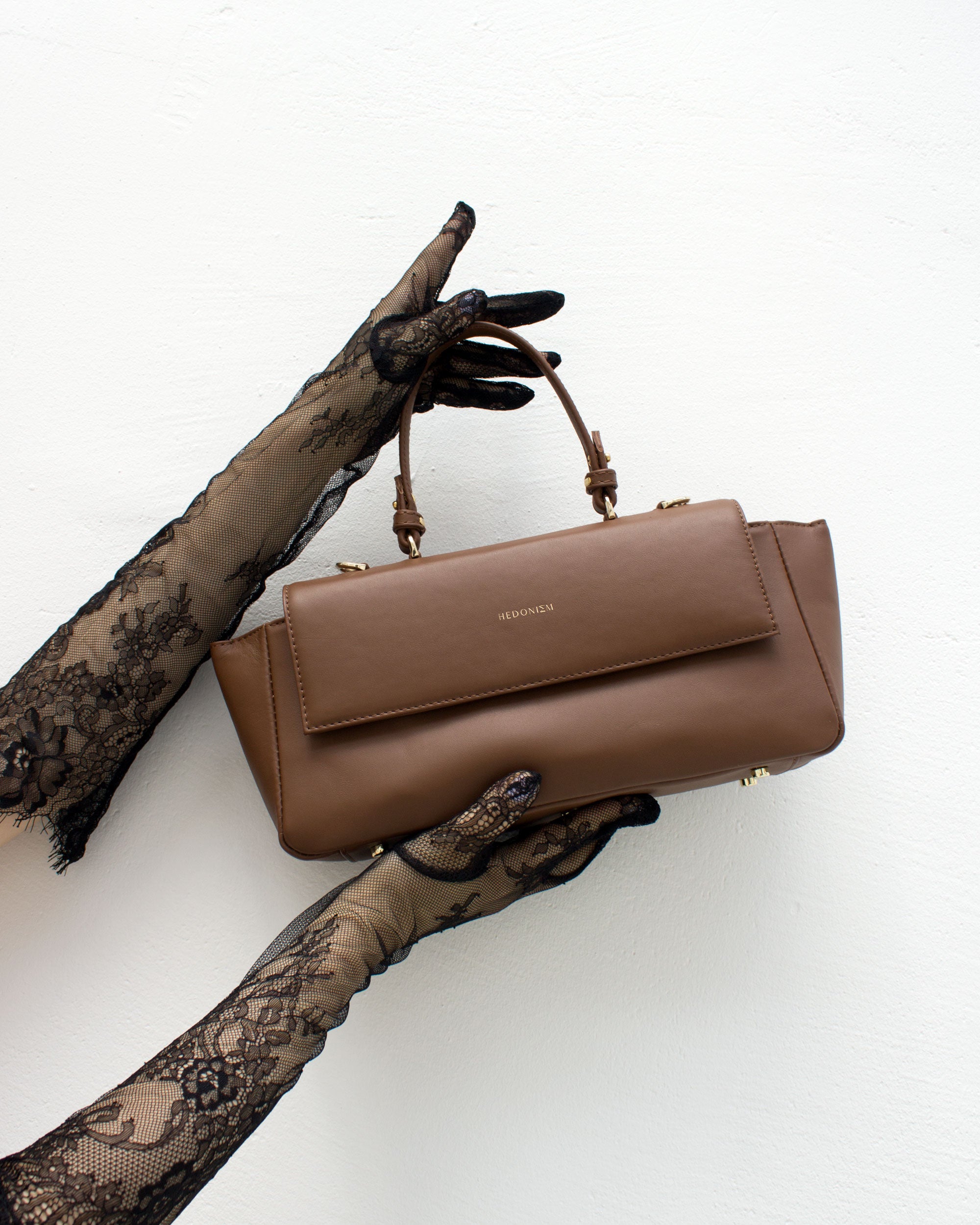 "Ophelia" crocodile-embossed leather. Available in several colors.