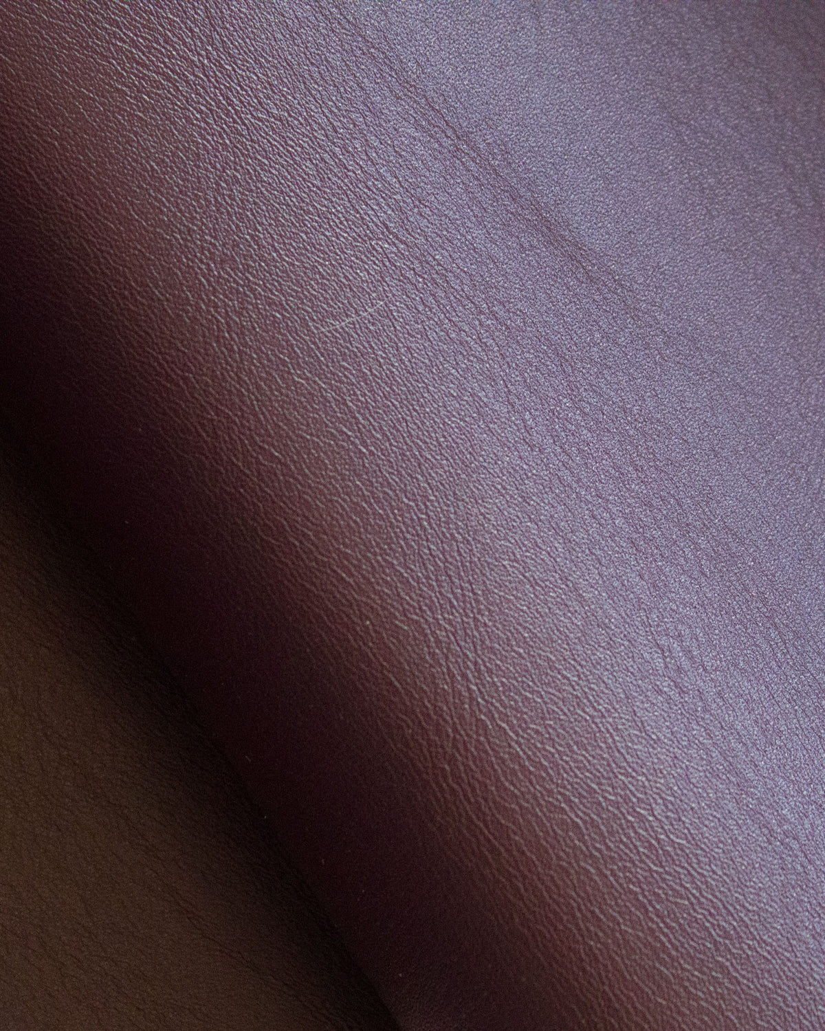 "Ophelia" crocodile-embossed leather. Available in several colors.