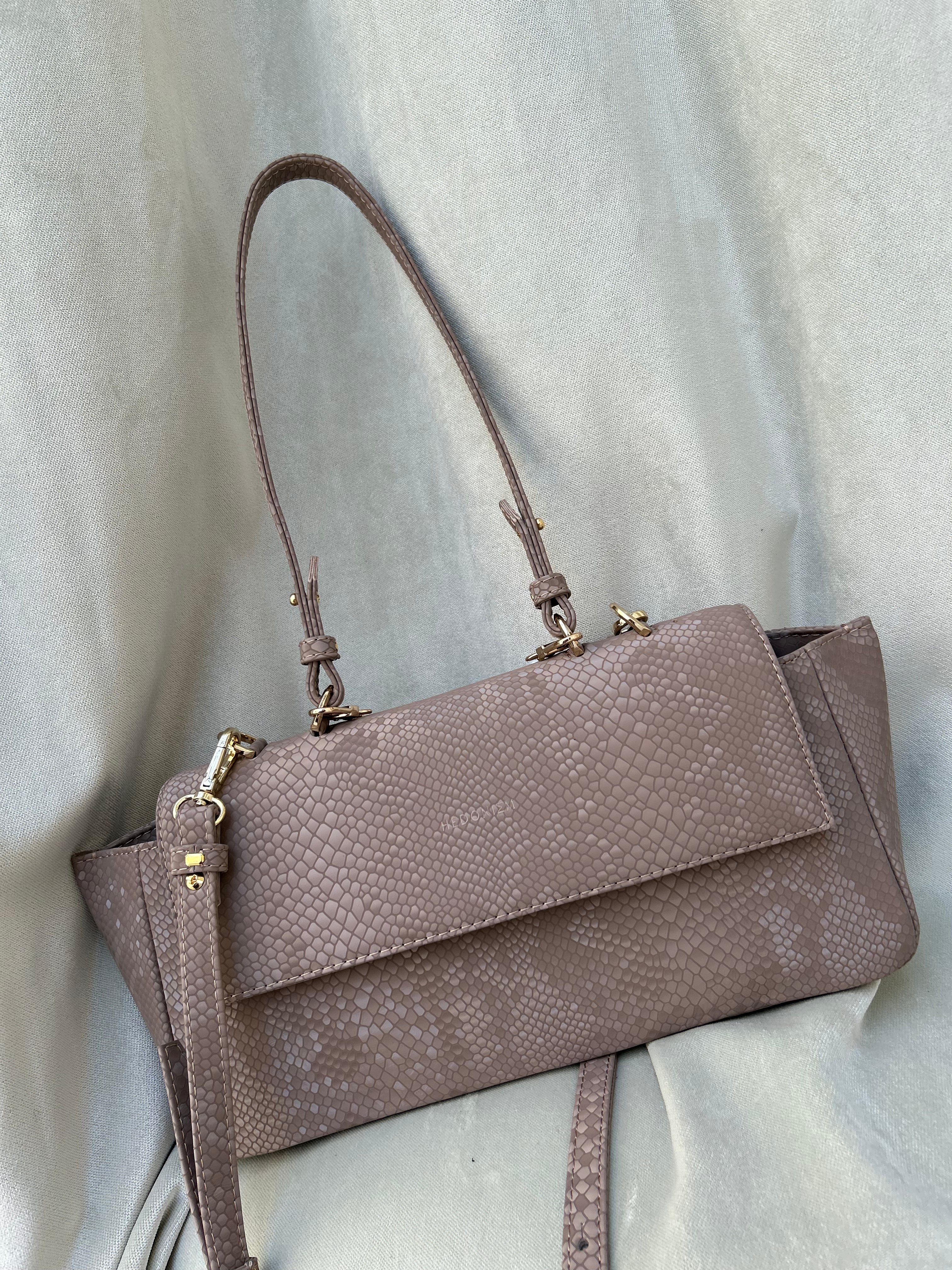 "Ophelia" crocodile-embossed leather. Available in several colors.